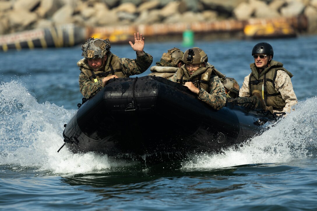 U.S. Marines with 1st Battalion, 1st Marine Regiment, 1st Marine Division, prepare for boat navigation during an amphibious raid course hosted by Expeditionary Operations Training Group, I Marine Expeditionary Force, at Marine Corps Base Camp Pendleton, California, June 21, 2023. The purpose of the amphibious raid course is to train raid force tactics, techniques, and procedures to enhance 1st Bn., 1st Marines’ capabilities in preparation for their deployment with the 31st Marine Expeditionary Unit.