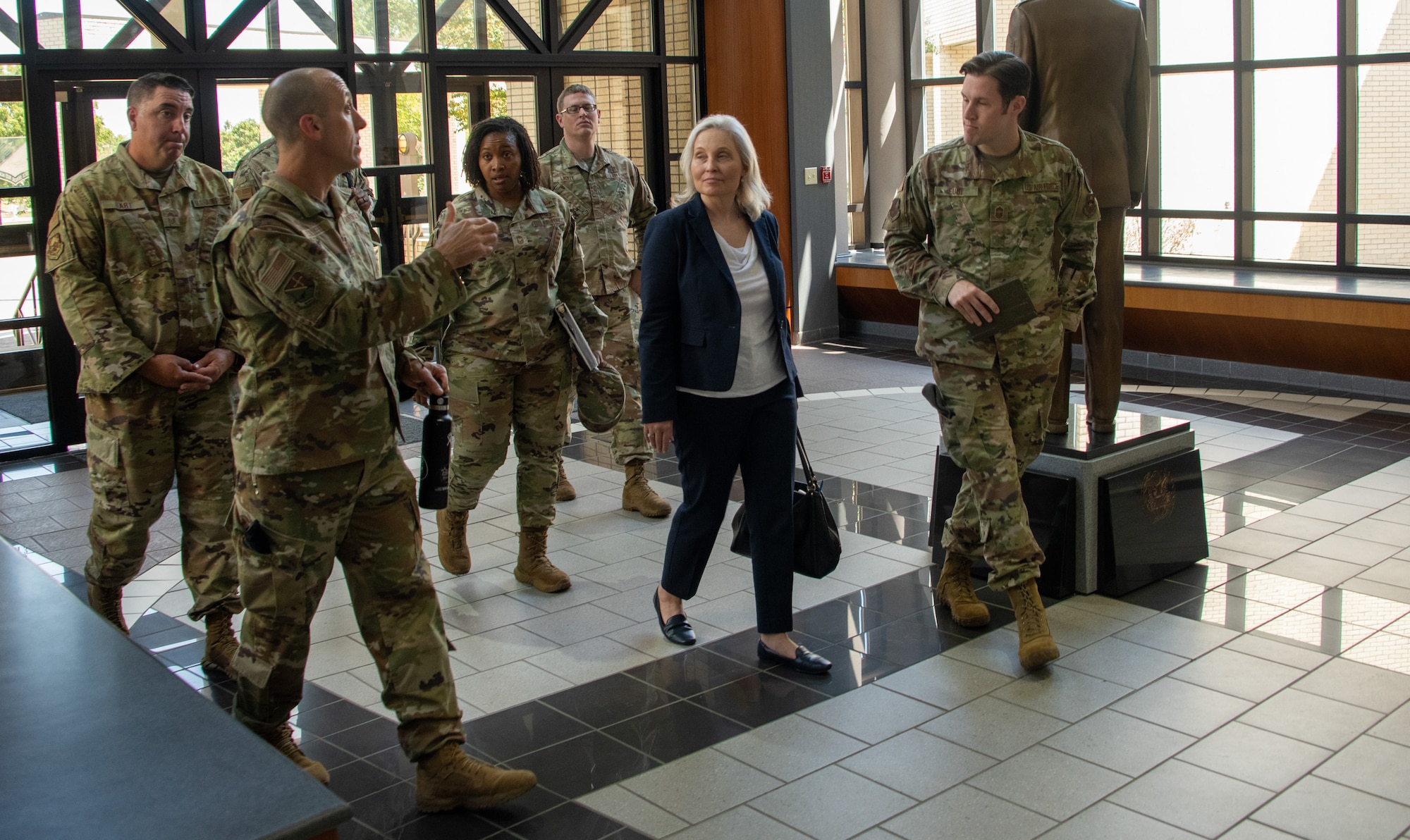 Crystal Moore, director of Force Development, Headquarters Air Force, is greeted by Senior Noncommissioned Officer Academy staff upon her arrival at Kisling Hall on Maxwell Air Force Base, Gunter Annex, Ala., Sept. 7, 2023. Moore took over as HAF Force Development director in June 2023, and was on Gunter Annex for an enlisted professional military education immersion. (U.S. Air Force photo/Brian Ferguson)