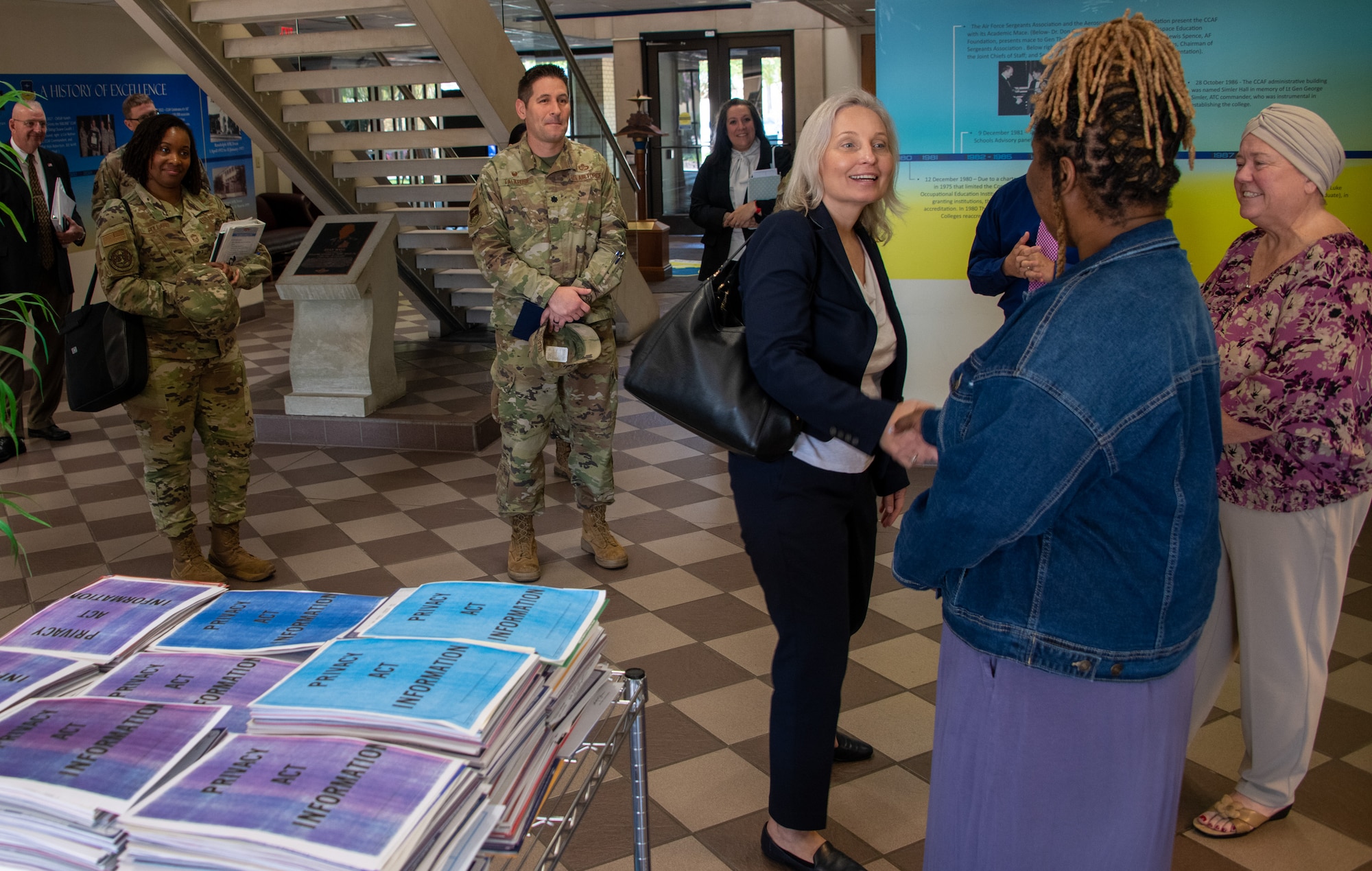 Crystal Moore, director of Force Development, Headquarters Air Force, talks with staff at the Community College of the Air Force on Maxwell Air Force Base, Gunter Annex, Ala., Sept. 7, 2023. Moore took over as HAF Force Development director in June 2023, and was at the CCAF for an enlisted professional military education immersion. (U.S. Air Force photo/Brian Ferguson)