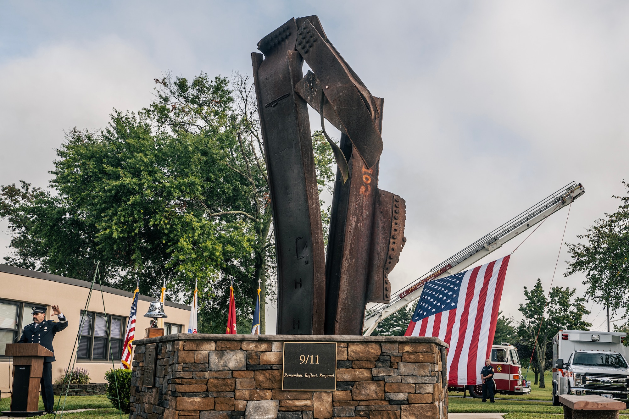 A photograph of a 9/11 memorial ceremony on JB MDL.