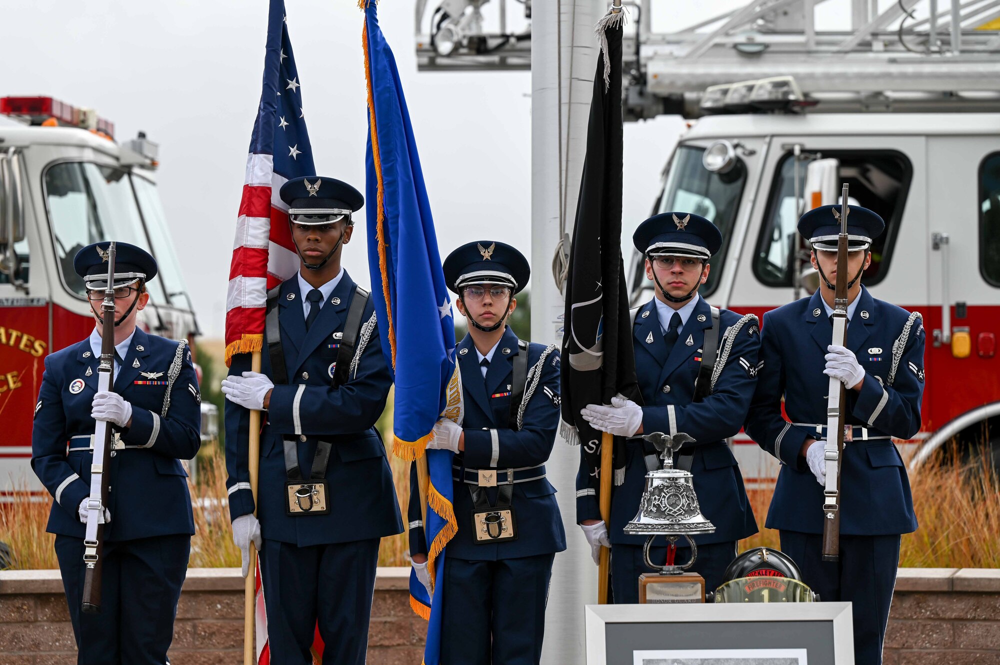Five members of Honor Guard post the colors.