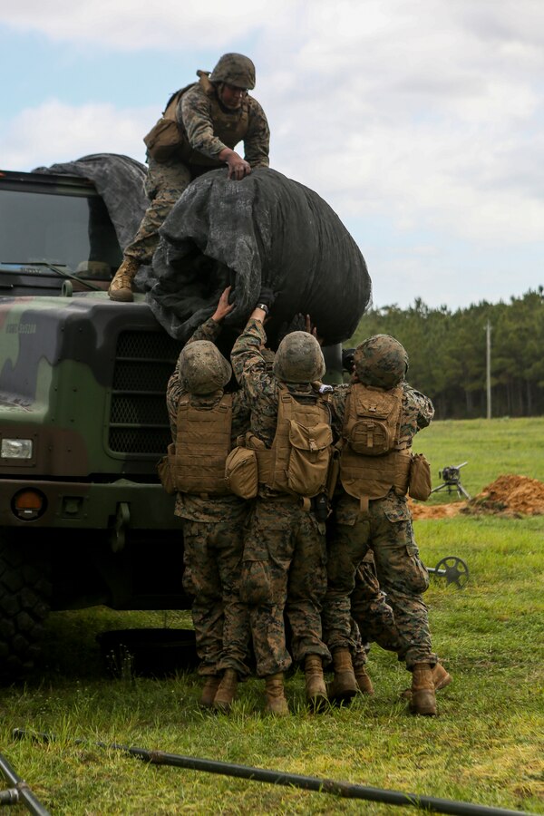 U.S. Marines with 3rd Battalion, 14th Marines, 4th Marine Division, prepare to set up a M777-A2 howitzer for an indirect fire exercise on Camp Lejeune, N.C., March 31, 2016. The exercise was designed to integrate, build relations with 10th Marine Regiment and conduct firing drills on unfamiliar terrain. (U.S. Marine Corps photo by Lance Cpl. Melanye E. Martinez, 2D MARDIV Combat Camera/Released)