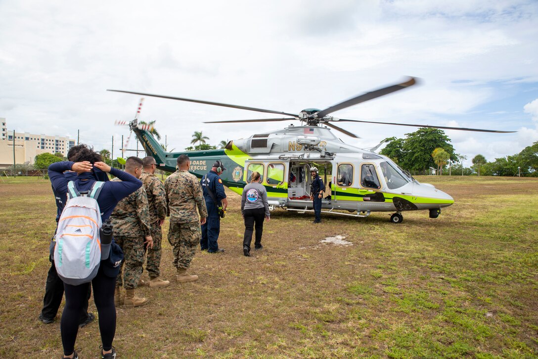 U.S. Marines with 4th Civil Affairs Group and U.S. Marine Corps Forces, South participate in a Disaster Field Operations Course (DFOC) hosted by Florida International University at their Biscayne Bay Campus, Florida, July 15-17, 2022. The DFOC is an interagency exercise designed to provide graduate students with experience in Humanitarian Assistance and Disaster Relief while in a foreign disaster scenario. Graduate students in the Academy for International Disaster Preparedness program conduct the course at FIU’s Herbert Wertheim College of Medicine as part of their annual capstone event. (U.S. Marine Corps photo by Sgt. Camila Melendez)