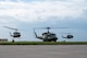 Three UH-1N Iroquois ,“Hueys”, assigned to the 54th Helicopter Squadron (HS) take off during a spouse orientation flight from Minot Air Force Base, North Dakota, Sept. 9, 2023. During the flight, Team Minot spouses received an aerial tour of MAFB’s area of responsibility. (U.S. Air Force photo by Airman 1st Class Alexander Nottingham)