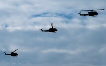 Three UH-1N Iroquois ,“Huey”s, assigned to the 54th Helicopter Squadron fly in formation during a spouse orientation flight over Minot Air Force Base, North Dakota, Sept. 9, 2023. During the flight, spouses received an aerial tour of MAFB’s area of responsibility. (U.S. Air Force photo by Airman 1st Class Alexander Nottingham)