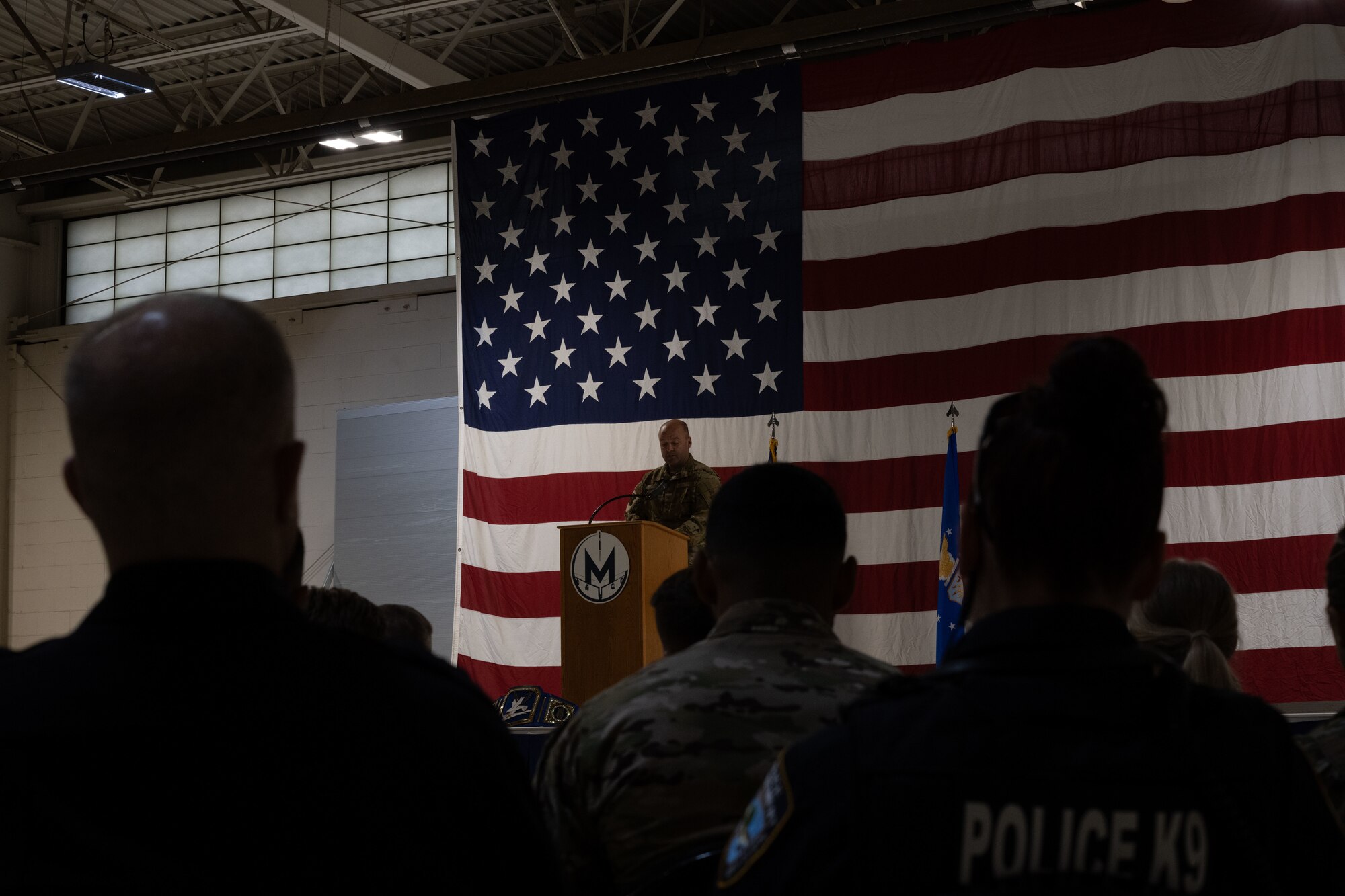 U.S. Air Force Col. Benjamin Jensen, 5th Bomb Wing Deputy Commander, speaks during a Patriot’s Day ceremony at Minot Air Force Base, North Dakota, Sept. 11, 2023. Patriot’s Day remembers those killed during the 9/11 attacks.  (U.S. Air Force photo by Airman 1st Class Trust Tate)