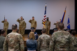Airmen and community members stand during the 9/11 remembrance ceremony Joint Base Andrews.