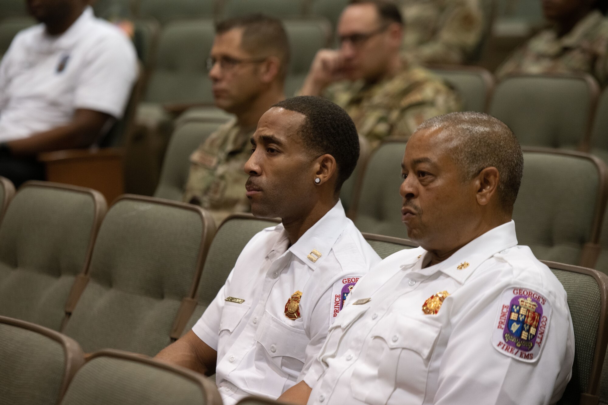 Prince George's county Police and Fire department members attend a 9/11 memorial ceremony at Joint Base Andrews