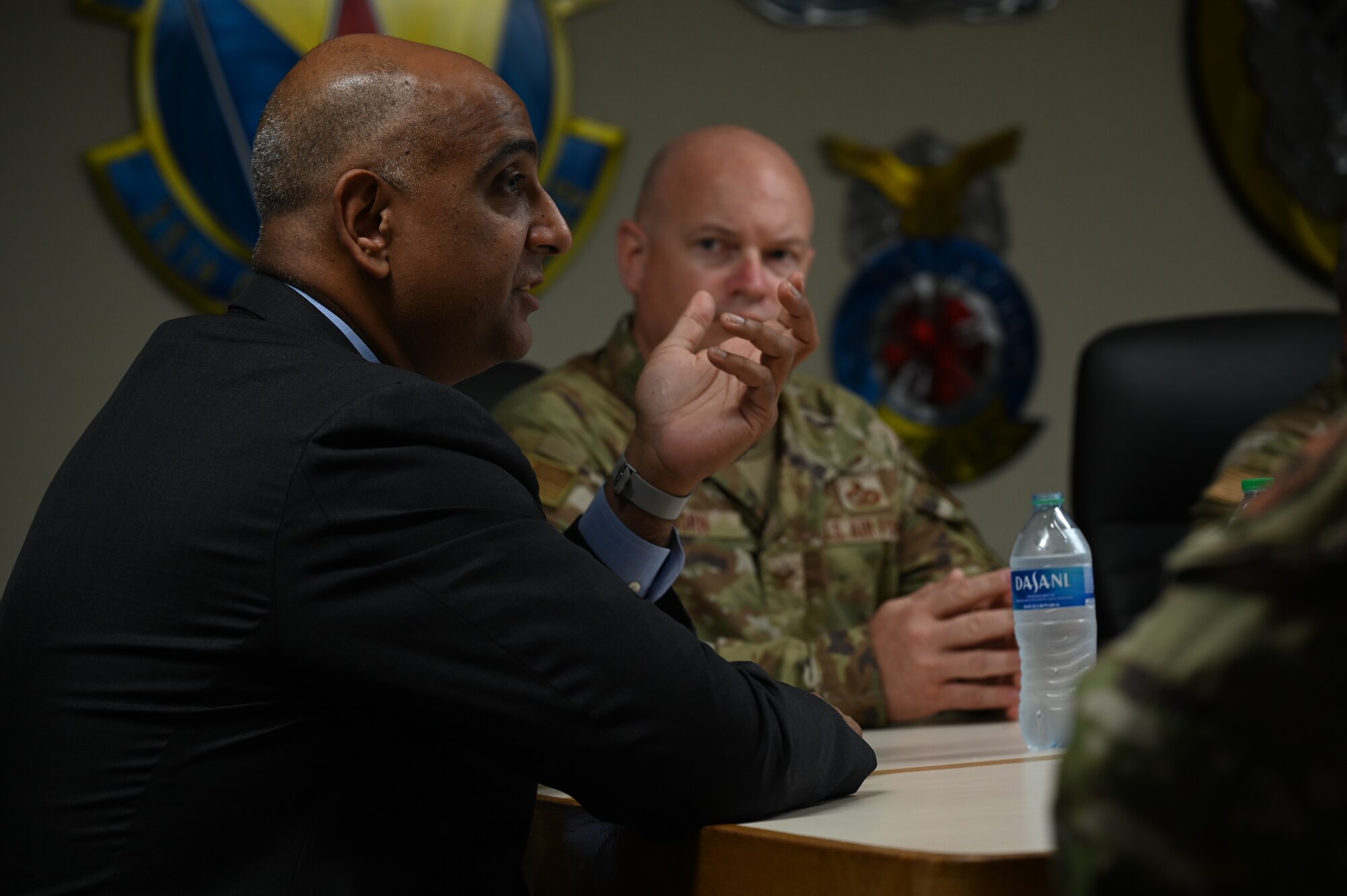 Dr. Ravi Chaudhary speaks to Airmen about future plans for 36th Wing's Typhoon Mawar recovery.