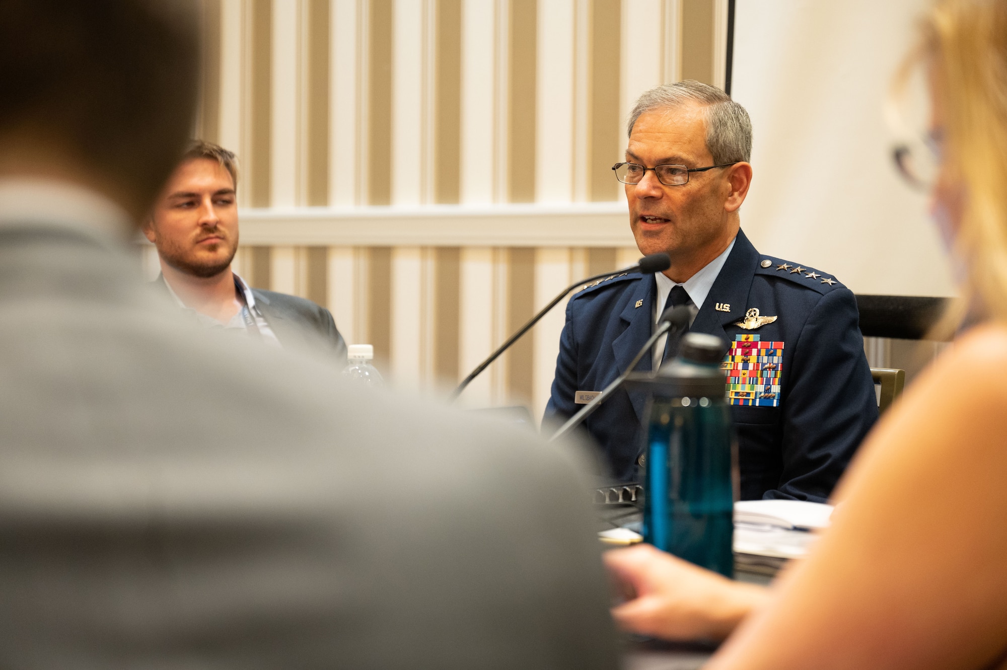 Gen. Ken Wilsbach, Pacific Air Forces commander, unveils “PACAF Strategy 2030: Evolving Airpower” during a media briefing at the Air and Space Forces Association’s Air, Space and Cyber Conference in National Harbor, Maryland, Sept. 11, 2023. PACAF leadership codified this strategy, based on the 2022 National Defense Strategy, to outline the strategic environment of the Indo-Pacific and empower a culture of evolving airpower. (U.S. Air Force photo by Master Sgt. Gena Armstrong)