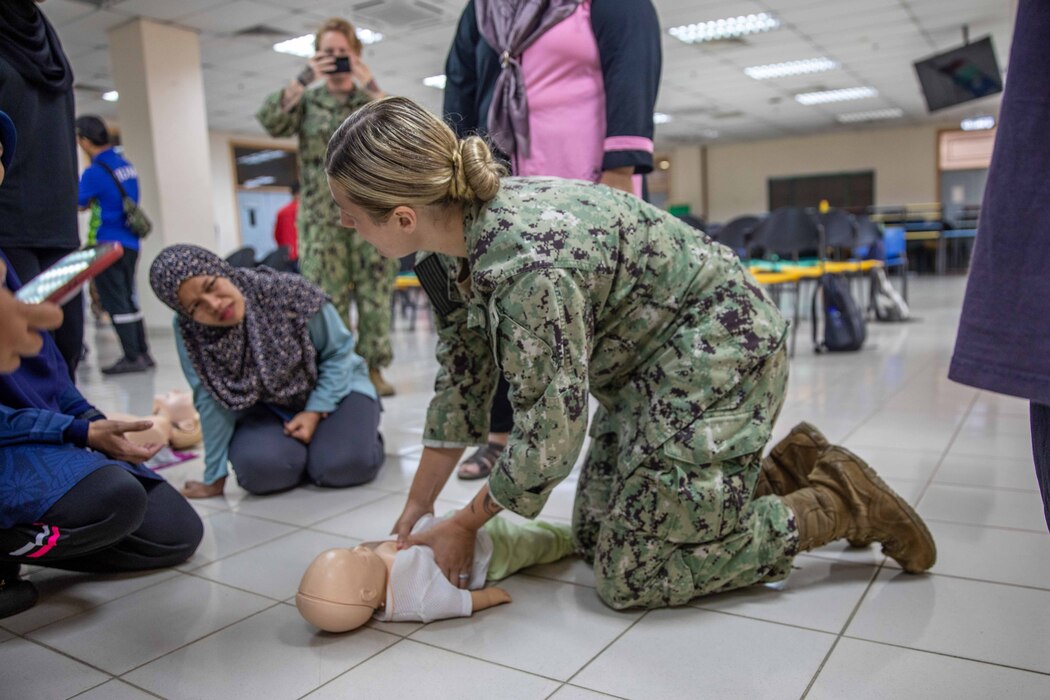 Pacific Partnership 2023 medical staff teach CPR in Malaysia.