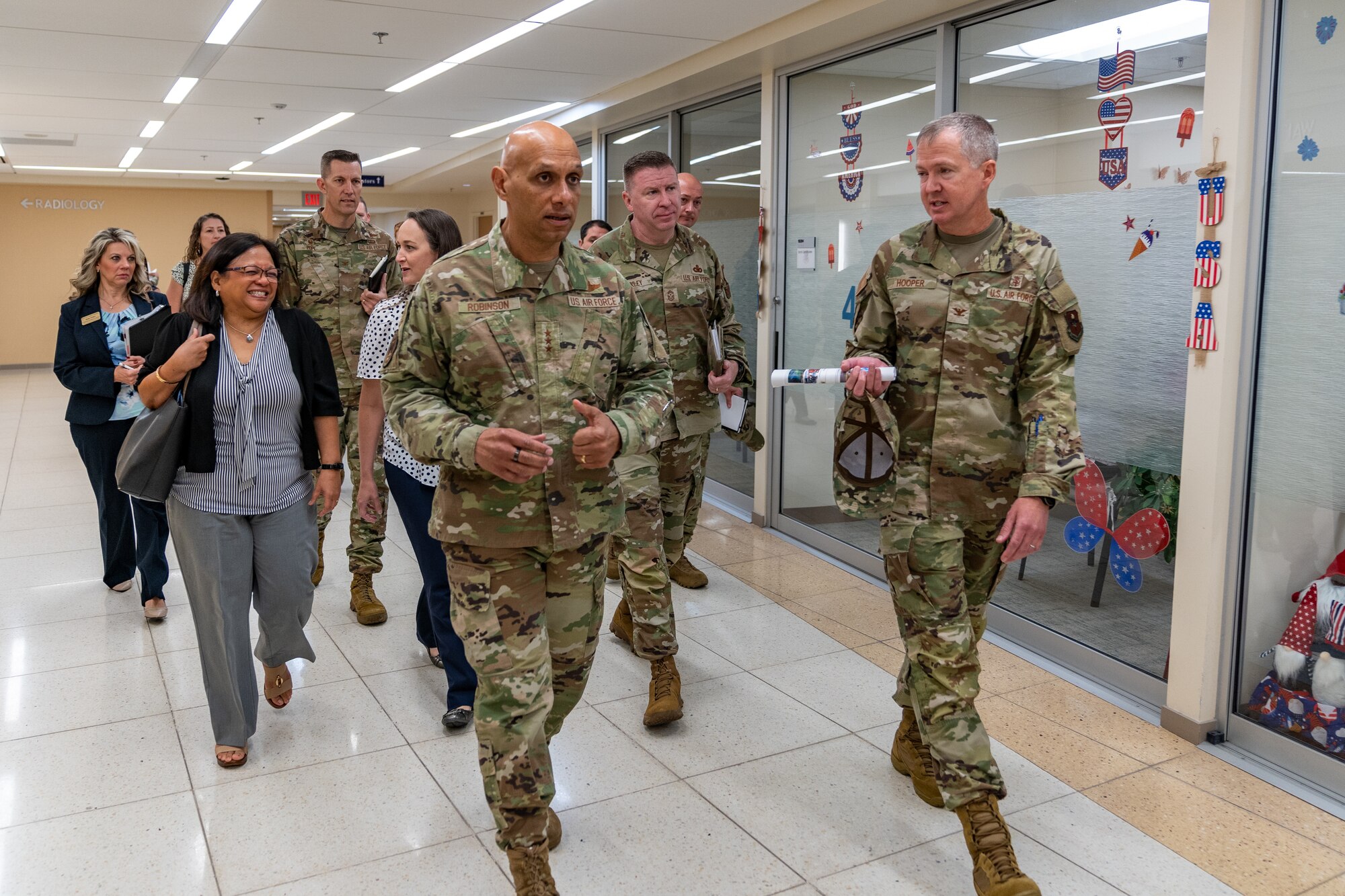 U.S. Air Force Col. Jeremy Hooper, 81st Medical Group deputy commander, briefs Lt. Gen. Brian Robinson, commander of Air Education and Training Command, on the group’s overall mission at Keesler Air Force Base