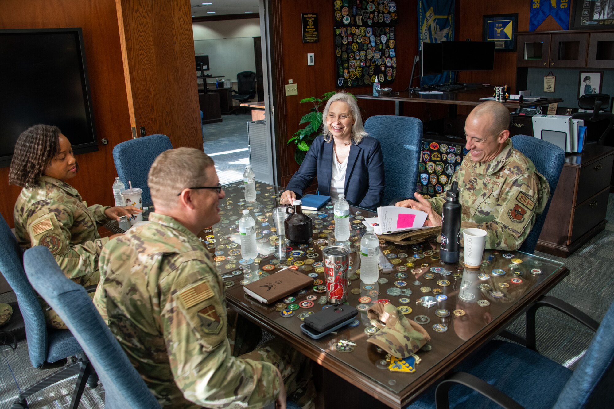 Crystal Moore, director of Force Development, Headquarters Air Force, and Chief Master Sgt. Kimberly Pollard, HAF Enlisted Developmental Education chief, left, sit for a meeting with the command team from the Thomas N. Barnes Center for Enlisted Education at Maxwell Air Force Base, Gunter Annex, Ala., Sept. 7, 2023. Moore took over as HAF Force Development director in June 2023, and was at the Barnes Center for an enlisted professional military education immersion. (U.S. Air Force photo/Brian Ferguson)
