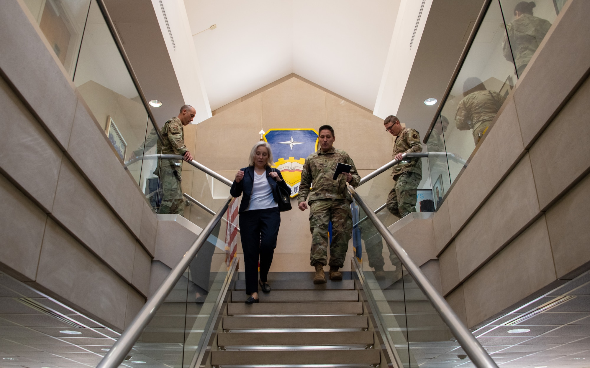 Crystal Moore, director of Force Development, Headquarters Air Force, is briefed by Lt. Col. Thomas Talafuse, Community College of the Air Force commander, during an enlisted professional military education immersion at Maxwell Air Force Base, Gunter Annex, Ala., Sept. 7, 2023. (U.S. Air Force photo/Brian Ferguson)