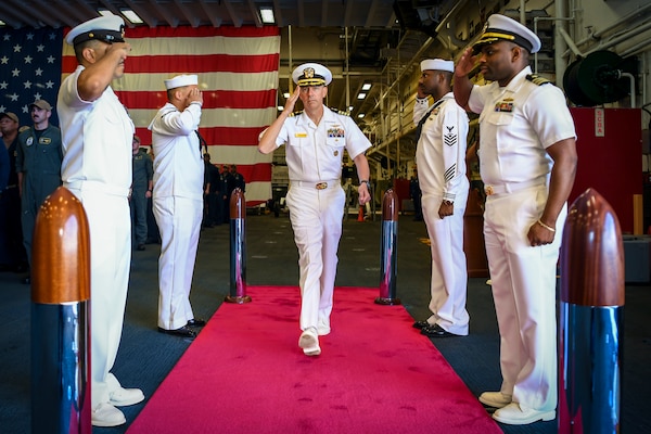 Capt. Brian Holmes aboard arrives for a change of command ceremony USS Boxer (LHD 4).