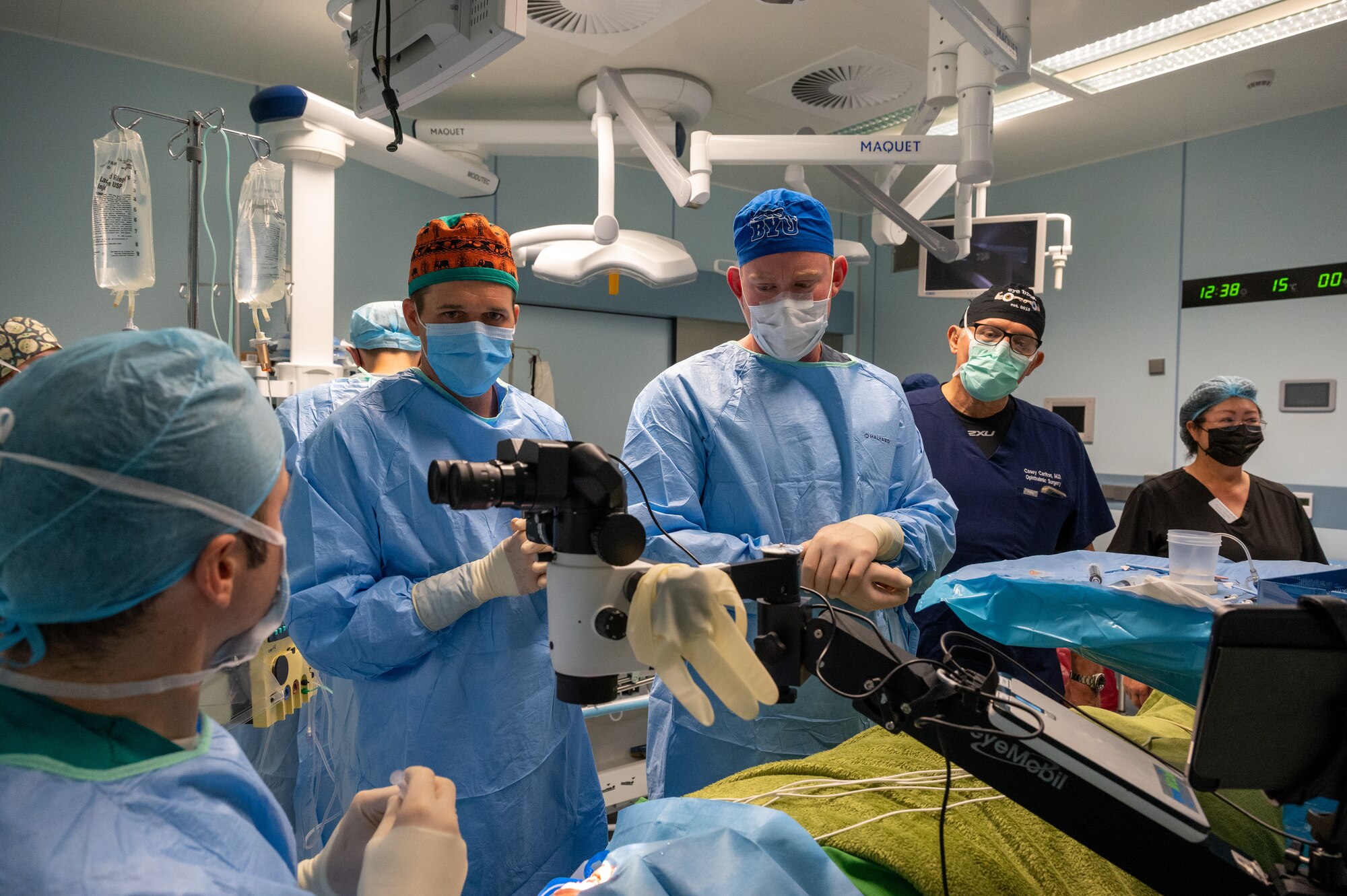 A team of military ophthalmologists discuss surgical approach prior to beginning a cataract surgery.