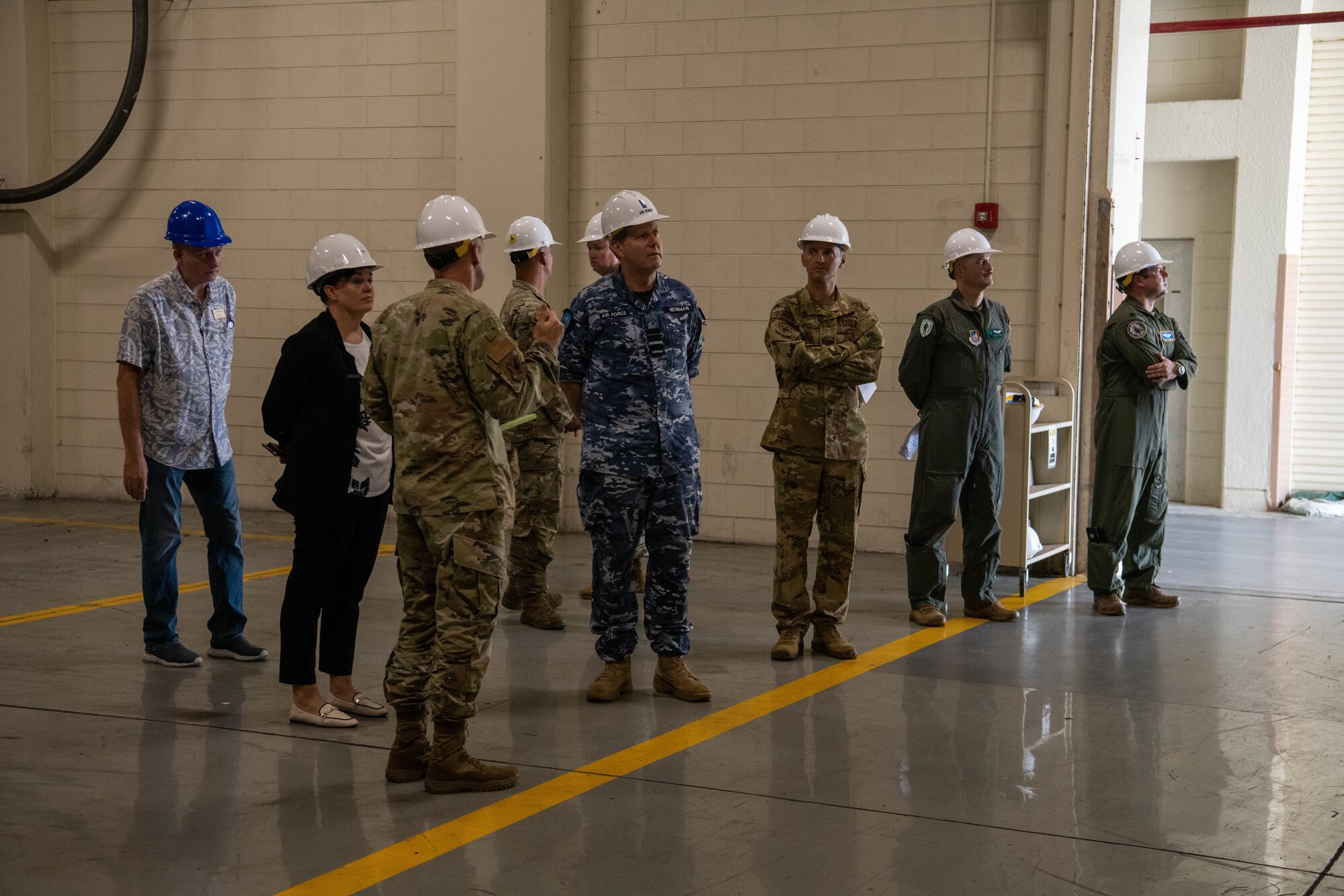 wing commander shows aircraft ground equipment flight chief, base infrastructure.