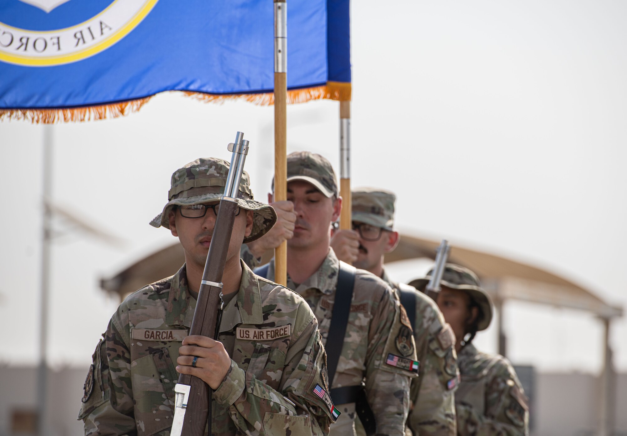 A photo of the honor guard marching.