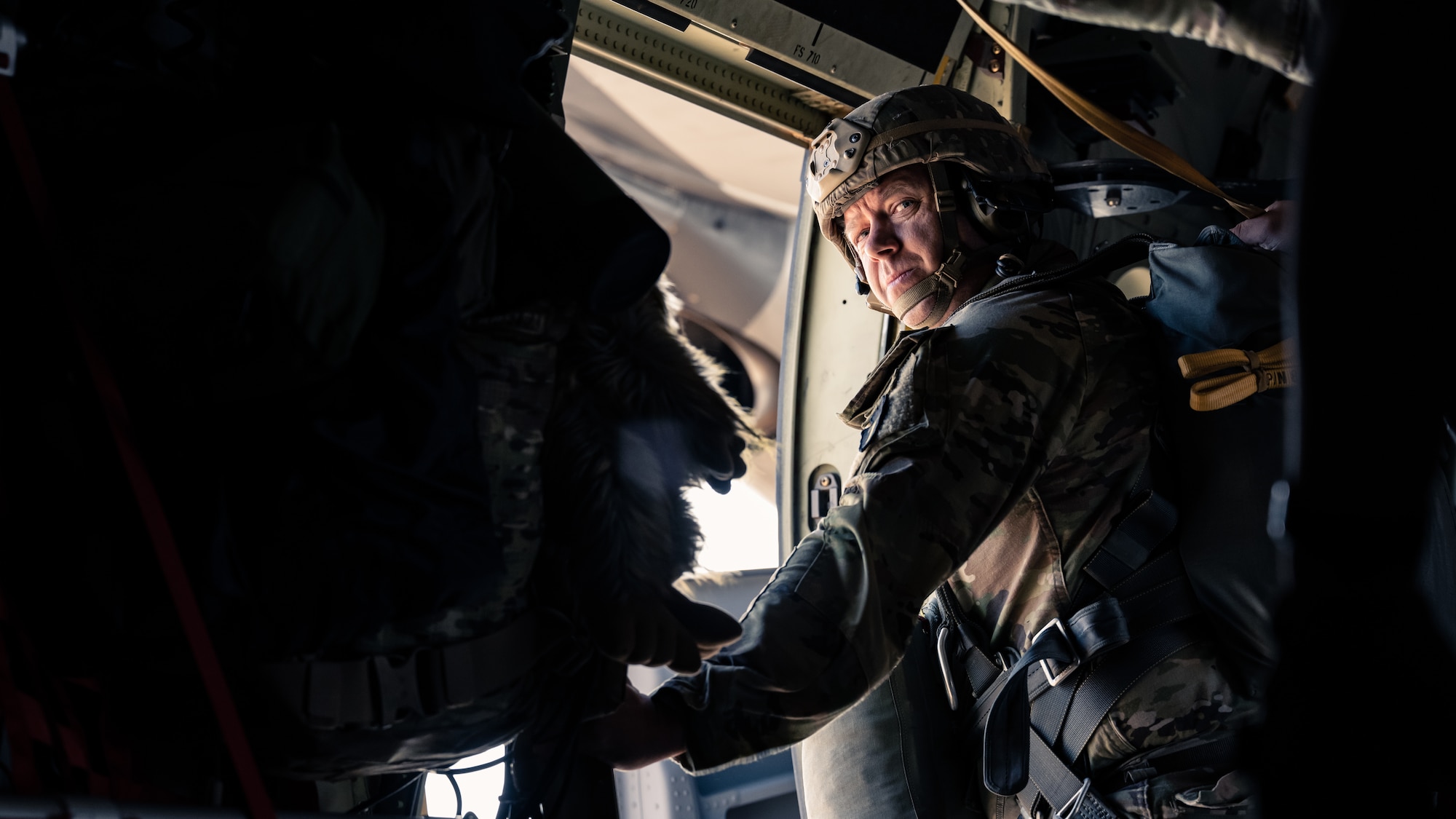 A Texas Army National Guard Soldier assigned to the 1st Battalion, 143rd Infantry Airborne Regiment prepares to jump from a C-130J Super Hercules from the 386th Air Expeditionary Wing during an airborne operation over Egypt in support of exercise Bright Star 23, Sept. 7, 2023. Bright Star 23 is a multilateral U.S. Central Command exercise held with the Arab Republic of Egypt across air, land, and sea domains that promotes and enhances regional security and cooperation, and improves interoperability in irregular warfare against hybrid threat scenarios. (U.S. Air Force photo by Staff Sgt. Kevin Long)