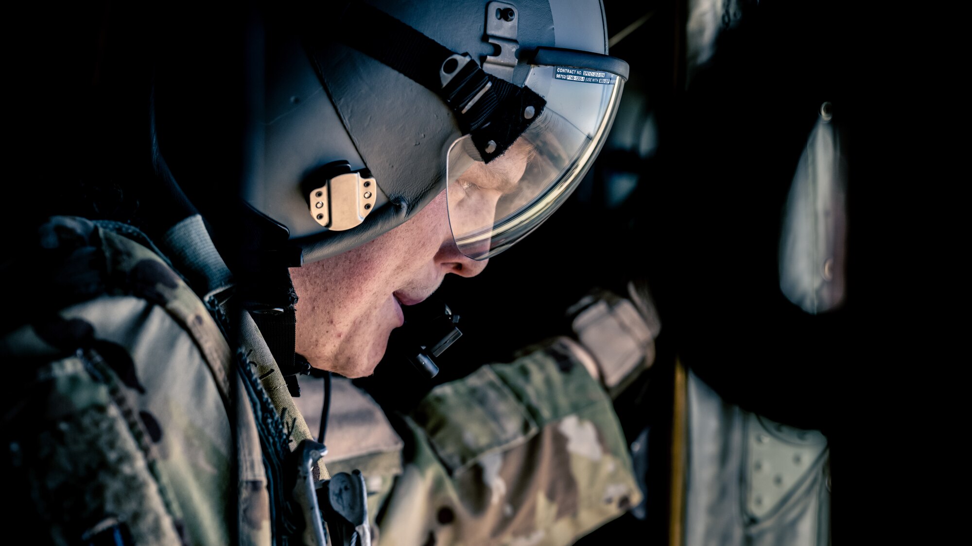 A U.S. Air Force loadmaster assigned to the 61st Expeditionary Airlift Squadron at the 386th Air Expeditionary Wing performs a safety check on the exit of a C-130J Super Hercules during an airborne operation over Egypt in support of exercise Bright Star 23, Sept. 7, 2023. Bright Star 23 is a multilateral U.S. Central Command exercise held with the Arab Republic of Egypt across air, land, and sea domains that promotes and enhances regional security and cooperation, and improves interoperability in irregular warfare against hybrid threat scenarios. (U.S. Air Force photo by Staff Sgt. Kevin Long)