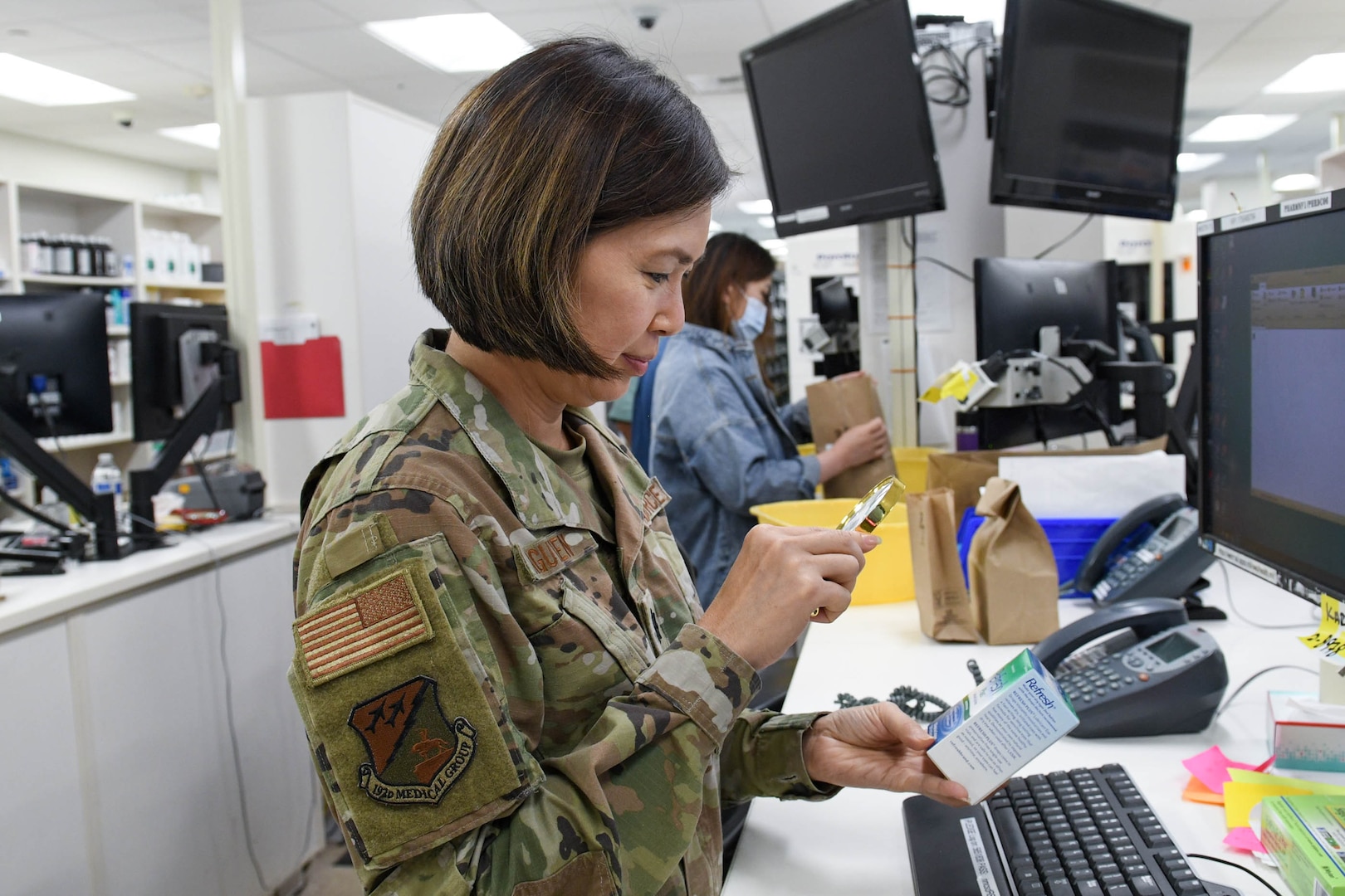 U.S. Air Force Maj. Nhon Nguyen, an anesthesiologist assigned to the 192nd Medical Group, works in the pharmacy during their Medical Facility Annual Training (MFAT) Aug. 23, 2023, at Naval Medical Center San Diego, California.