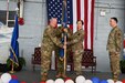 Brig. Gen. Michael J. Regan Jr. poses with Col. Lynn M. Lee as she assumes command of the 111th Attack Wing during a ceremony at Biddle Air National Guard Base on Saturday, Sept. 9, 2023. Lee is the Wing's first female commander. (U.S. Air National Guard photo by Staff Sgt. Timi Jones)