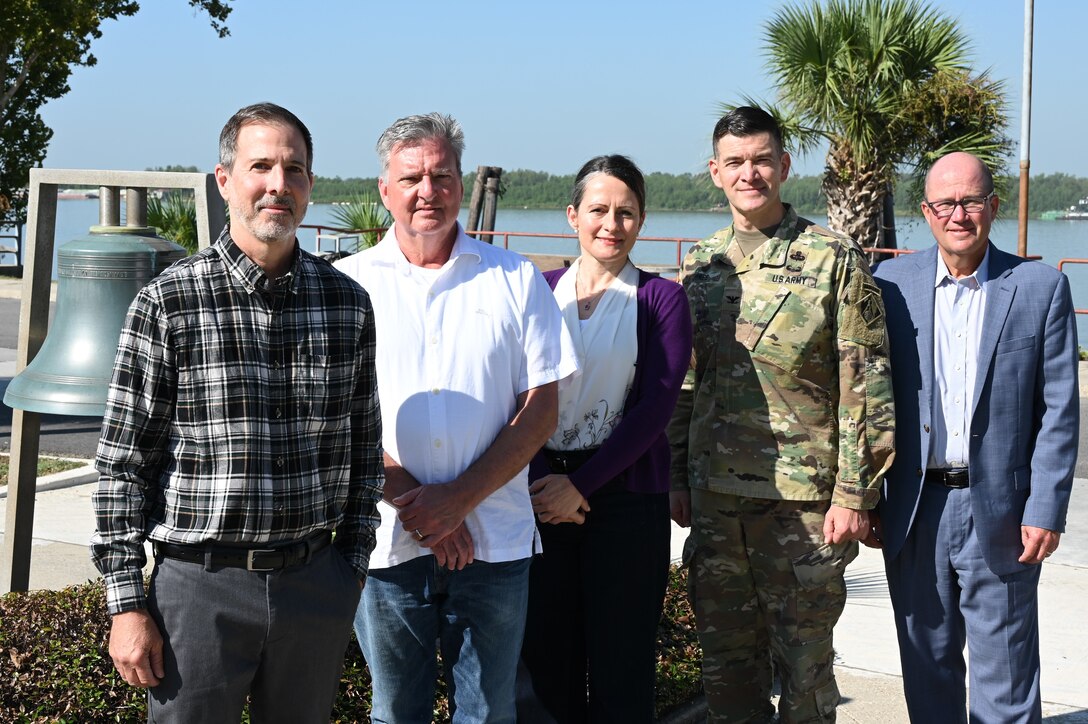 Team members from the U.S. Army Corps of Engineers, New Orleans District (MVN), pose for a photo after having been recognized Sept. 6, 2023, during the 2022 Lean Six Sigma Excellence Awards Program (LEAP) for their innovation in helping to improve the Defense Performance Management and Appraisal Program (DPMAP) process throughout the New Orleans District and Mississippi Valley Division of the Corps of Engineers. They were awarded for creating the MVN DPMAP Status Dashboard, an automated dashboard to enable leaders and supervisors to ensure each employee covered under DPMAP receives a performance plan, mid-year review, and appraisal on time. Pictured left to right are team leader David Ulm, team members John Eblen and Sabine Faltenbacher, as well as New Orleans District commander Col. Cullen Jones, and deputy district engineer Mark Wingate, who provided additional support and feedback for the project. Other team members and contributing support personnel not pictured include Paul Landry, Ozzy Orwick, Kevin Fuqua, Durund Elzey, Lt. Col. David Cox, Frank DeBoer, Lyan Hughes-Ingram, Joel Torres and Janet Yarnell.