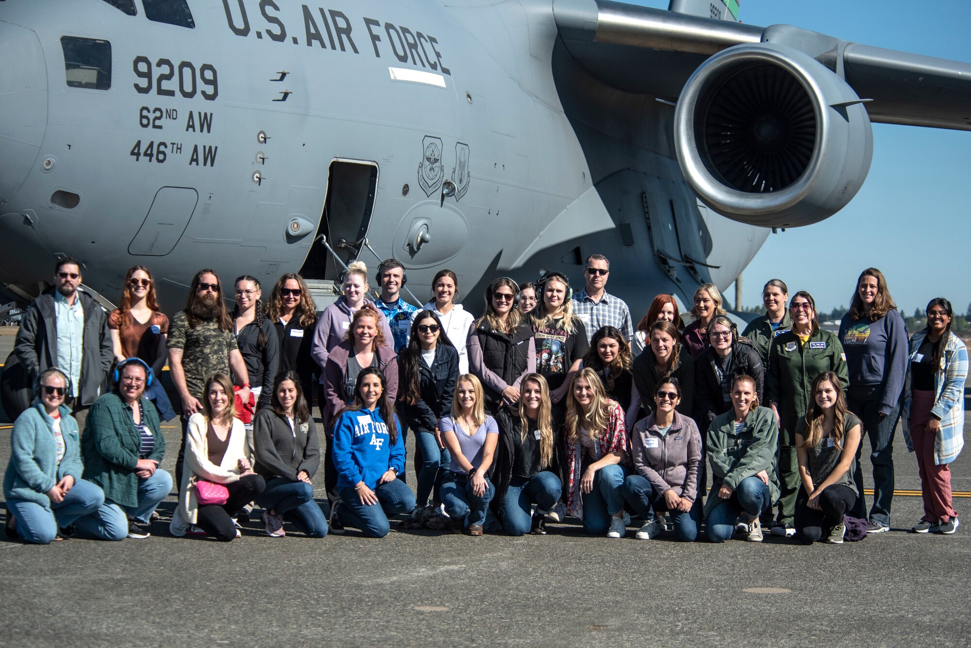 Spouses day provided a unique opportunity for service members’ spouses to receive a mission brief and participate in a flight on a C-17 Globemaster III. (U.S. Air Force photos by Airman 1st Class Kylee Tyus)