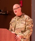 Newly promoted Illinois Army National Guard Col. Paul Metzdorff, of Bloomington, the Illinois Army National Guard Military Personnel Officer, thanks his family and friends for their support throughout his military career, Sept. 8 during a promotion ceremony at the Astroth Community Education Center, Heartland Community College, Normal, Illinois.