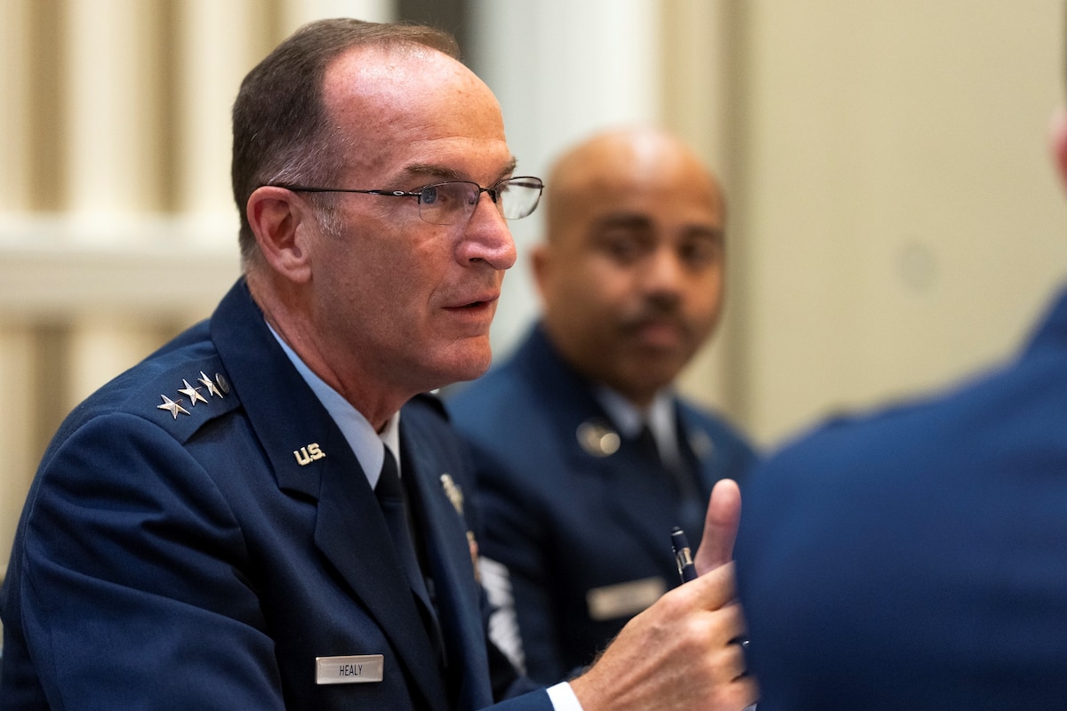 Photo of Lt. Gen. John P. Healy, Chief Master Sgt Israel Nunez speaking at a media roundtable.