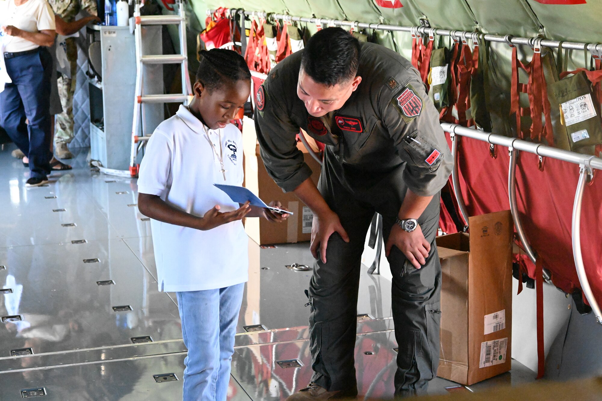 More than 1,500 children from the island came to speak to aviators and tour a KC-135 from September 7 – 8 as part of the Air Force Recruiting Service’s Aviation Inspiration Mentorship (AIM) High program. (U.S. Air Force photo by Capt. Danielle Hudson)