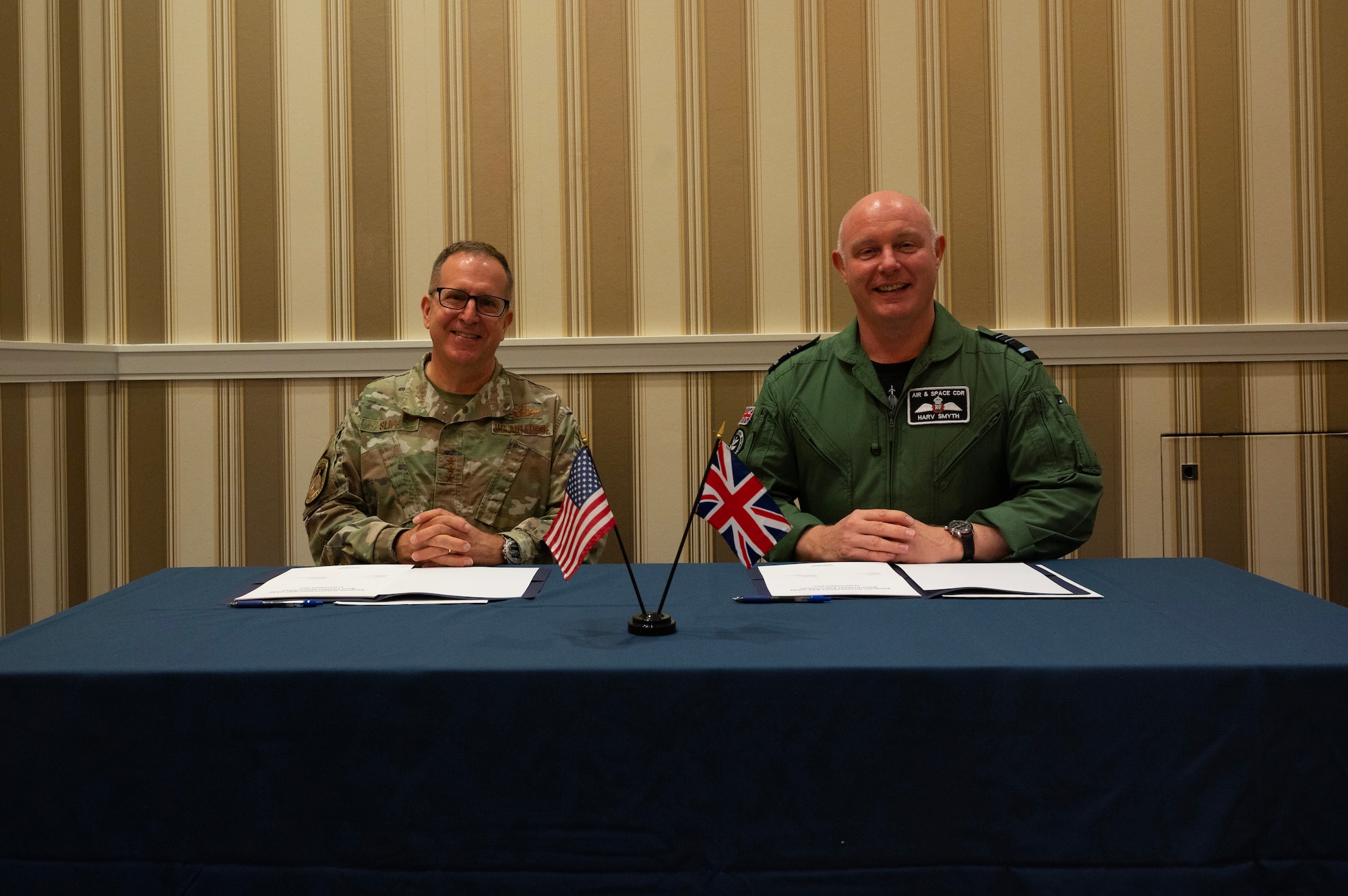 Lt. Gen. Jim Slife, U.S. Air Force Deputy Chief of Staff for Operations, and Royal Air Force's Air and Space Commander Air Marshal Harv Smyth sign a Combined Vision Statement on Agile Combat Employment in National Harbor, Md., Sept. 12, 2023. (U.S. Air Force photo by Tech. Sgt. Nick Z. Erwin)