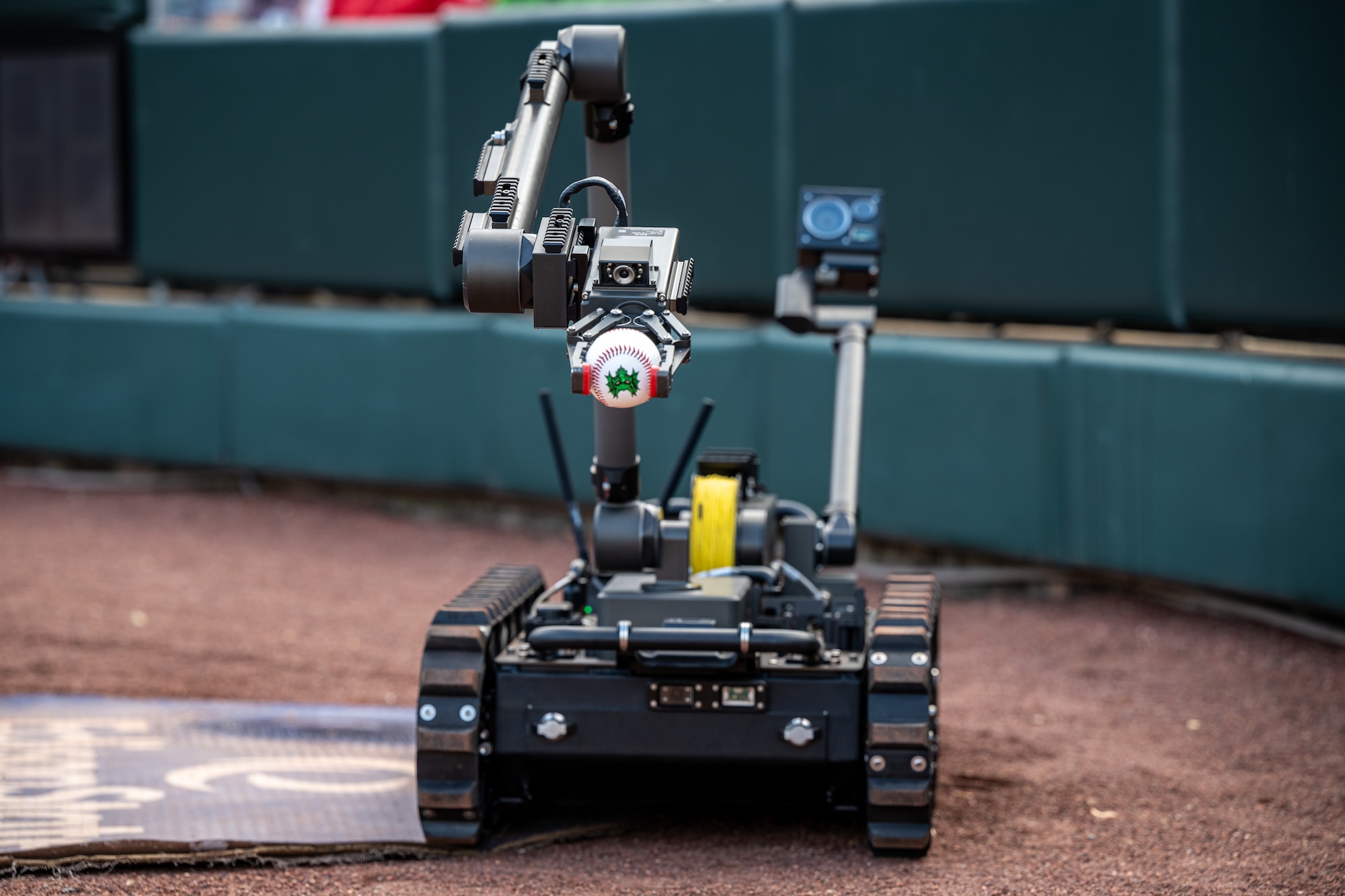 788 CES EOD robot delivers game ball