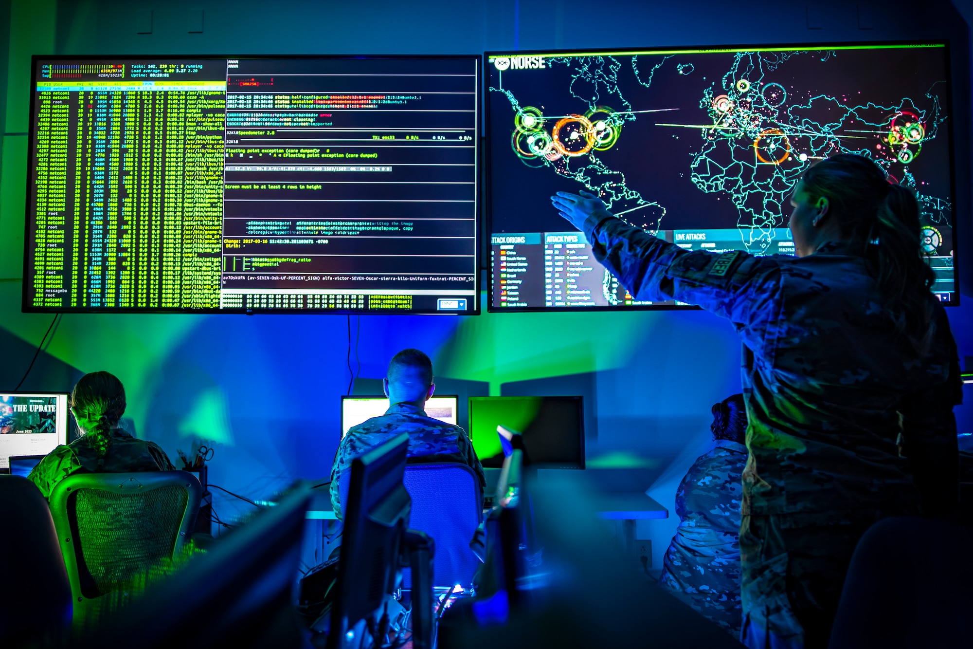 Members of the Ohio Air National Guard stage a cyber themed photography session at Mansfield Lahm ANGB, Ohio, June 4, 2023.