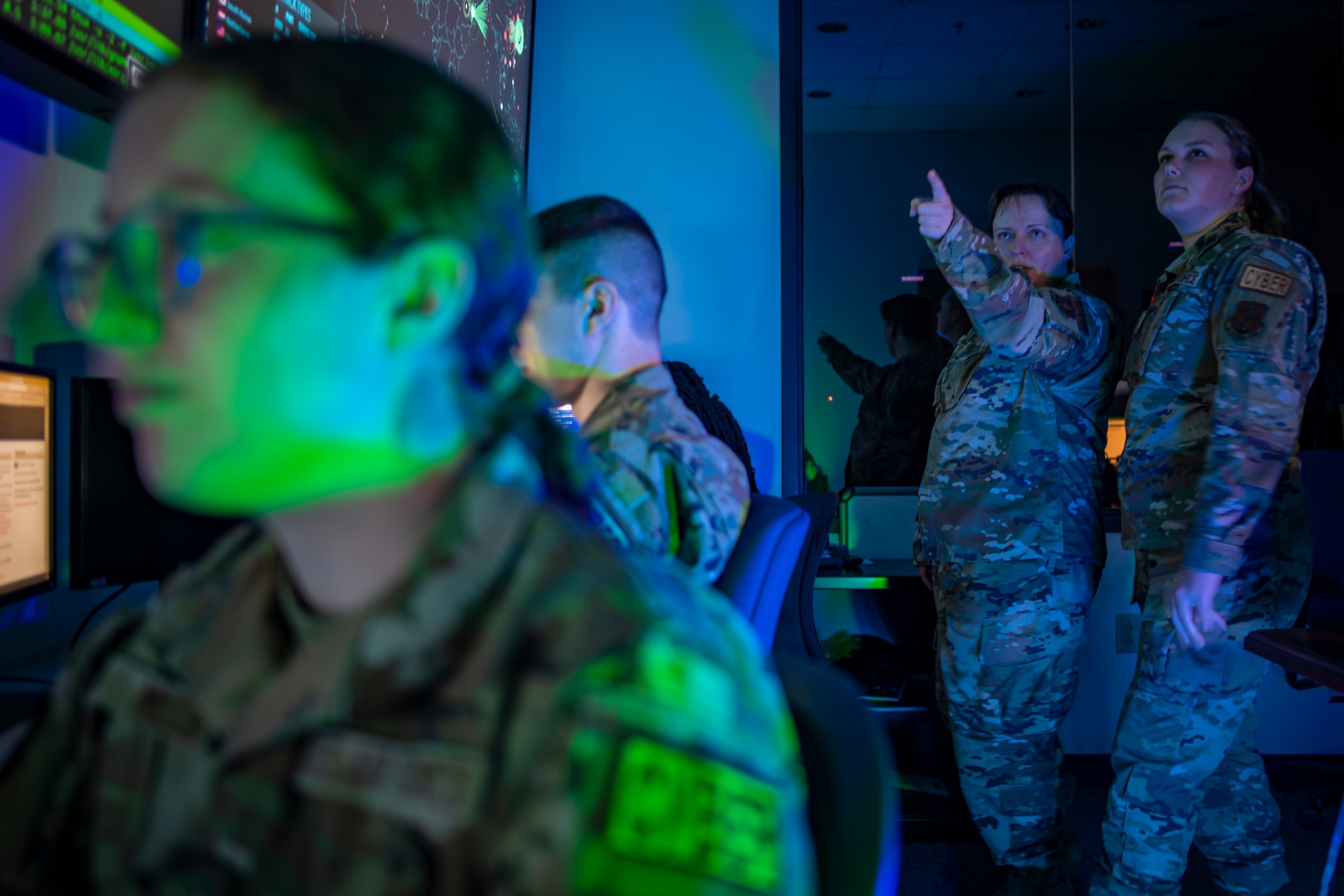 Members of the Ohio Air National Guard stage a cyber themed photography session at Mansfield Lahm ANGB, Ohio, June 4, 2023.