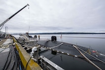 Sailors load cargo onto the fast attack submarine USS Seawolf (SSN 21) at Naval Magazine Indian Island, Washington March 28, 2022. Indian Island is the U.S. Navy’s only deep-water ammunition port on the West Coast, where the installation can provide conventional ordnance support to vessels ranging from destroyers to submarines and aircraft carriers. (U.S. Navy photo by Mass Communication Specialist 2nd Class Gwendelyn L. Ohrazda)