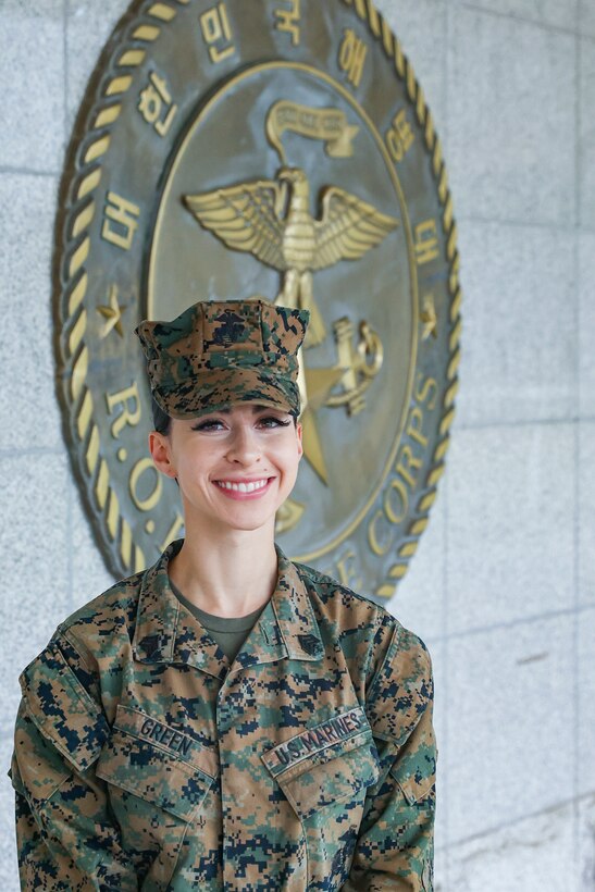 U.S. Marine Corps Sgt. Sophia Green and Republic of Korea Marine Cpl. Andrew Kim pose for a photo in front of a monument at Camp Baran, Republic of Korea Marine Corps Headquarters, during Exercise Ulchi Freedom Shield 23. The monument reads from top to bottom: Loyalty, Honor, Challenge. This is the motto of the ROK Marine Corps. Green, a San Diego, Calif., native served as the Camp Commandant for UFS 23. Kim, a Daegu, South Korea native, served as a translator on the watch floor of the operations center during UFS 23. Ulchi Freedom Shield is an annual exercise designed to strengthen the combined defense posture and Alliance response capabilities based on scenarios that reflect diverse threats within the security environment. This creates an opportunity for ROK and III MEF Marines to train together while conducting the live, virtual, and constructive exercise events that reaffirming the U.S.’s ironclad commitment to the defense of the ROK (U.S. Marine Corps photo by Maj. Gabriel Adibe)