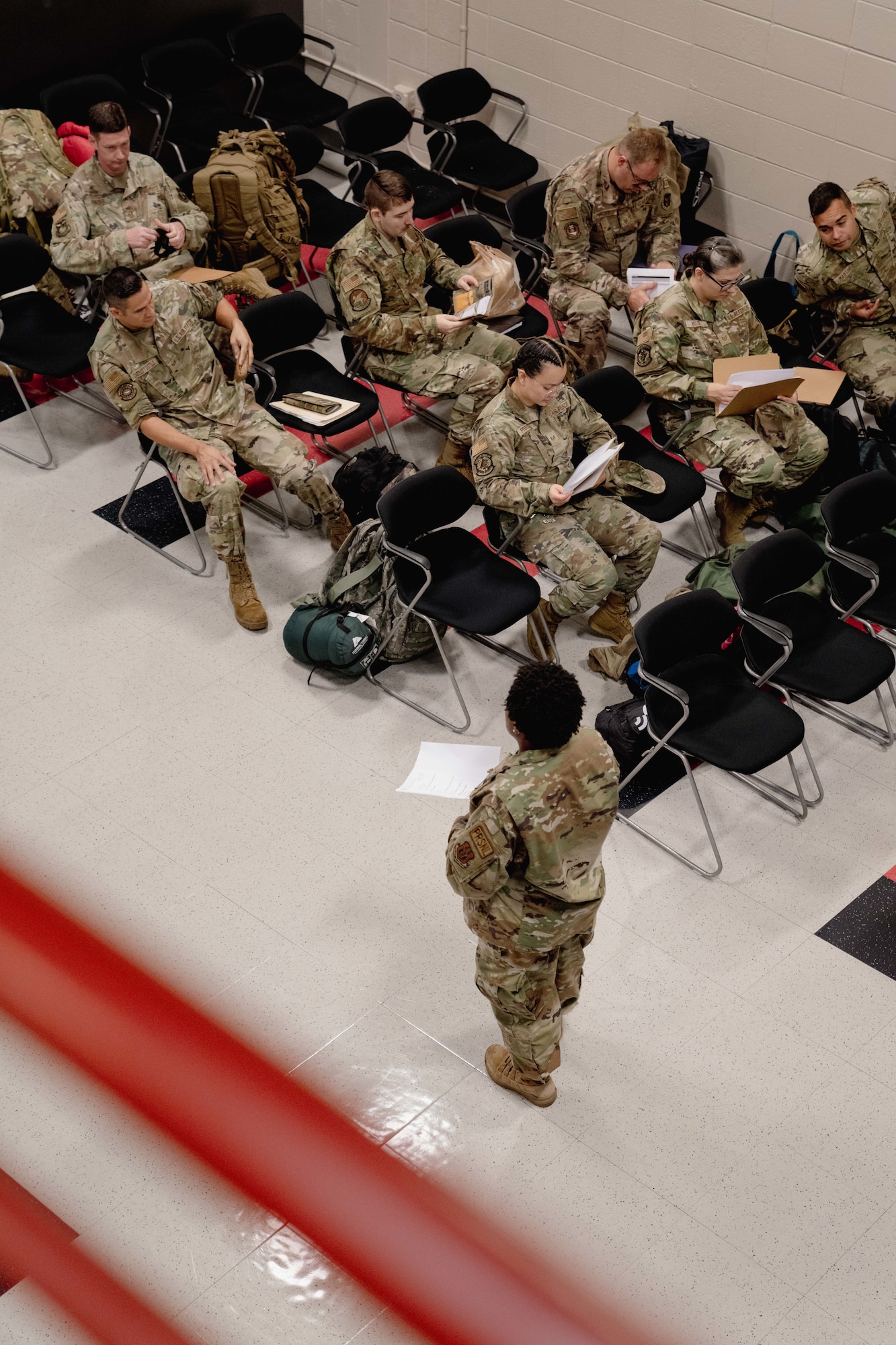 Members of the 94th Airlift Wing are processed through a pre-deployment function line before departing for the  Rally in the Pacific 2023 exercise at Dobbins Air Reserve Base, Ga, September 8, 2023. The exercise is geared towards incorporating agile combat employment concepts in order to ensure that forward-deployed forces are ready to protect and defend the U.S. and to ensure that U.S. forces are capable and ready to face the evolving challenges within the Indo-Pacific region. (U.S. Air Force photo by MSgt. Miles Wilson)