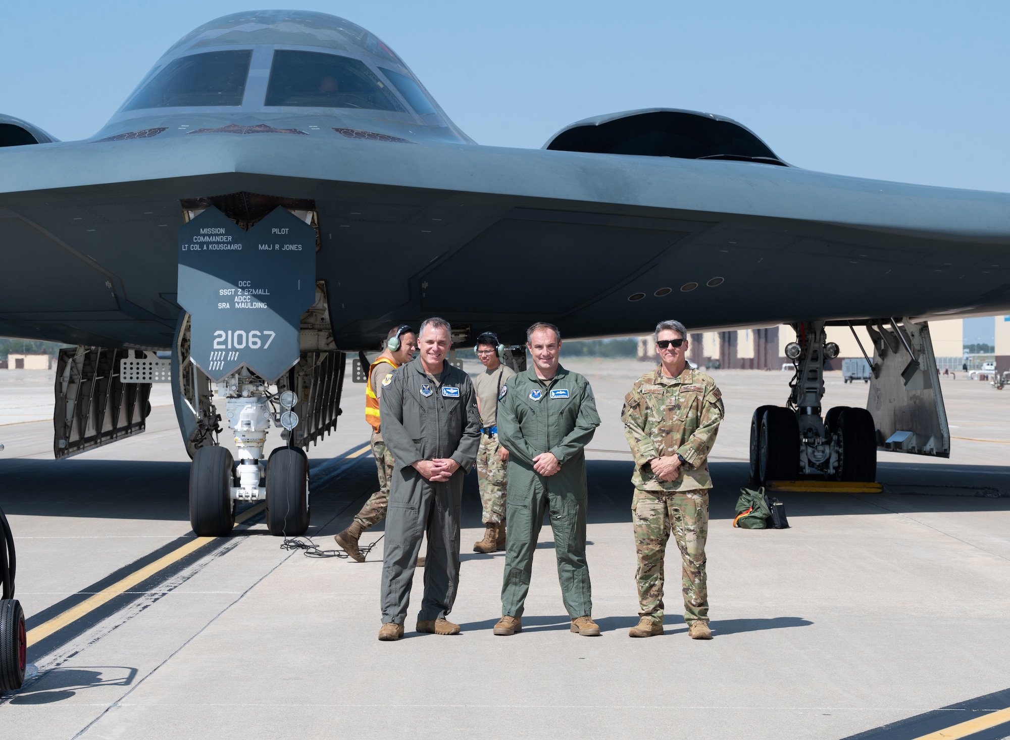 U.S. Air Force Col. Keith Butler, 509th Bomb Wing commander, left, Royal Air Force Air Vice-Marshal Allan Marshall, Ministry of Defense assistant chief of defense staff, center, and U.S. Air Force Maj. Gen. Jason Armagost, 8th Air Force commander, right, pose in front of a B-2 Spirit stealth bomber at Whiteman Air Force Base, Mo., Sept. 8, 2023. Marshall’s visit was to get a better understanding of the B-2’s capabilities to penetrate an adversary's most sophisticated defenses. (U.S. Air Force photo by Airman 1st Class Joseph)