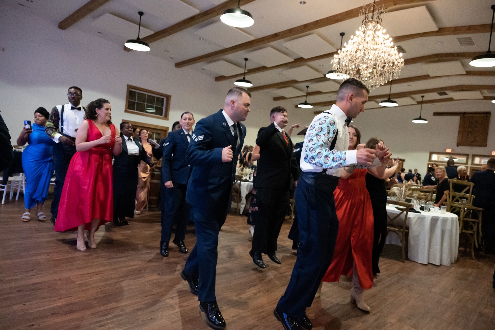 Team Dover members dance during the 76th Air Force Ball in Dover, Delaware, Sept. 8, 2023. The Dover AFB Air Force Ball celebrated the 76th anniversary of the U.S. Air Force. (U.S. Air Force photo by Airman 1st Class Dieondiere Jefferies)