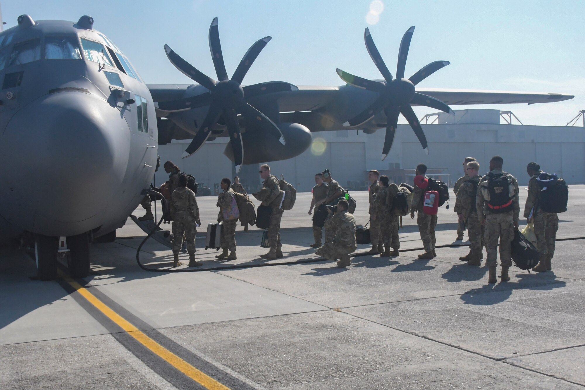 Airmen from the 94th Airlift Wing board a C-130H3 on the flight line at Dobbins Air Reserve Base, Ga.
