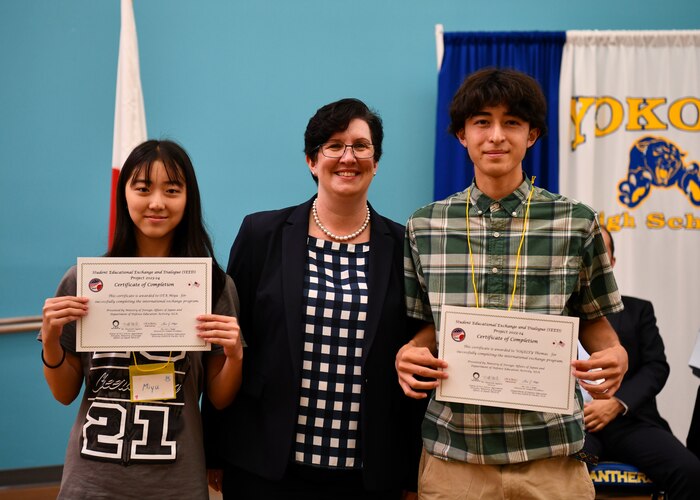 Dr. Jacqueline Ferguson, Department of Defense Education Activity Pacific superintendent, poses for a photo with two students who just received certificates of completion during the Student Educational Exchange and Dialogue (SEED) project at Yokota Air Base, Japan, Sept. 10, 2023. Yokota High School hosted the first of seven SEED events slated for the 2023-2024 school year. (U.S. Air Force photo by Staff Sgt. Spencer Tobler)