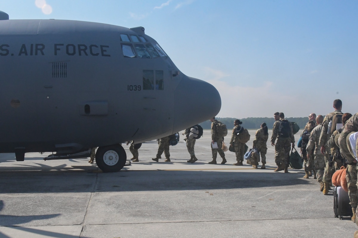 Airmen from the 94th Airlift Wing board a C-130H3 on the flight line at Dobbins Air Reserve Base, Ga.