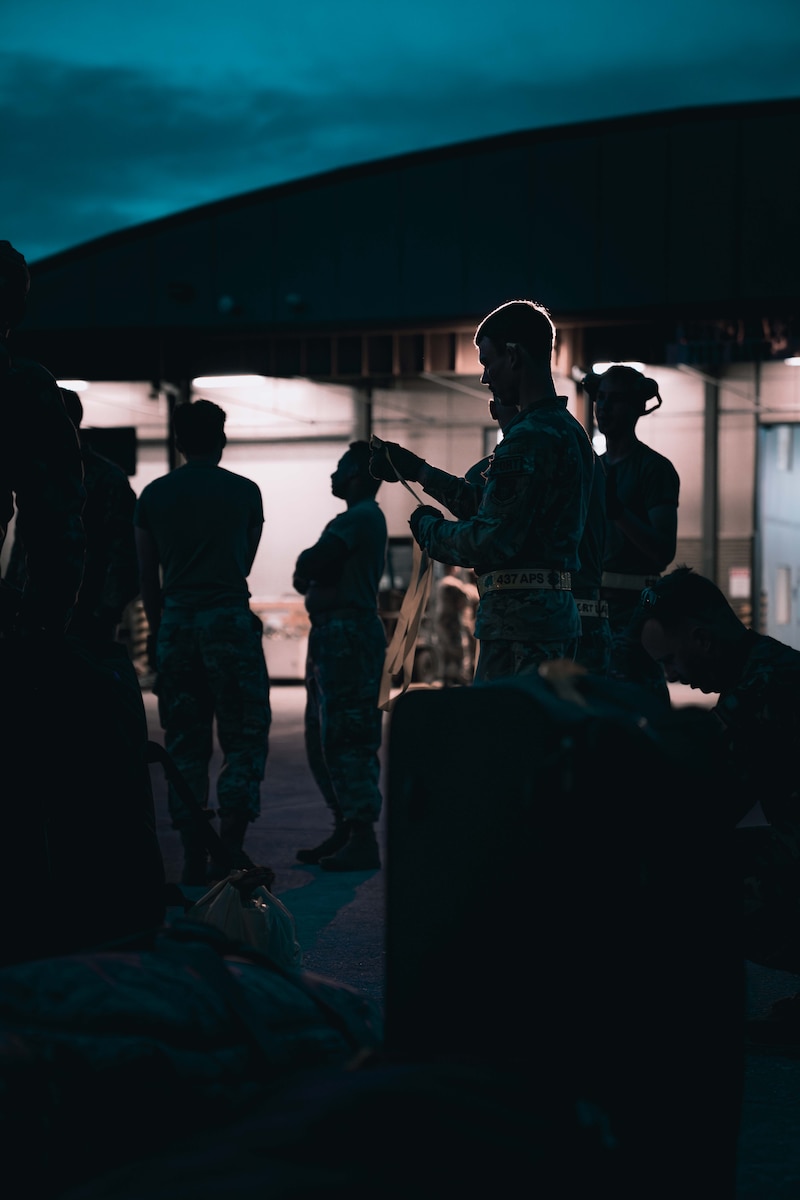 Members of the 80th Aerial Port Squadron stage gear and baggage as members of the 94th Airlift Wing prepare to depart for the Rally in the Pacific 2023 exercise at Dobbins Air Reserve Base, Ga, September 8, 2023. The exercise is geared towards incorporating agile combat employment concepts in order to ensure that forward-deployed forces are ready to protect and defend the U.S. and to ensure that U.S. forces are capable and ready to face the evolving challenges within the Indo-Pacific region. (U.S. Air Force photo by MSgt. Miles Wilson)