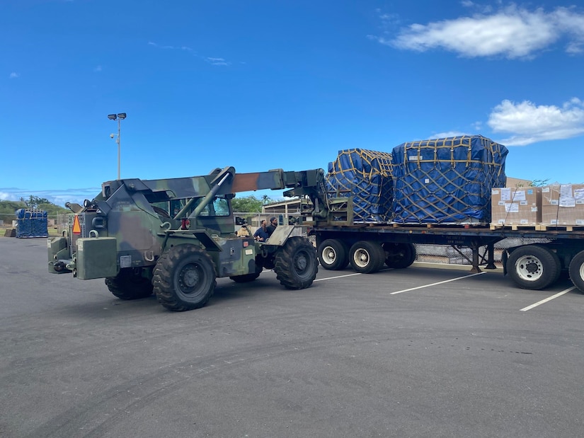 Soldiers assigned to the 871st Engineer Vertical Construction Company drives a Skytrak Fork lift to off load supplies, Aug. 2023. Stationed at the Kaoru Moto U.S. Army Reserve Center, located in Wailuku, Maui Soldiers from various units within the 9th MSC have combined efforts with the 871st Engineer Vertical Construction Company (EVCC) as part of Task Force Pueo, stepping in to aid their fellow Soldiers and civilians impacted by the wildfires.