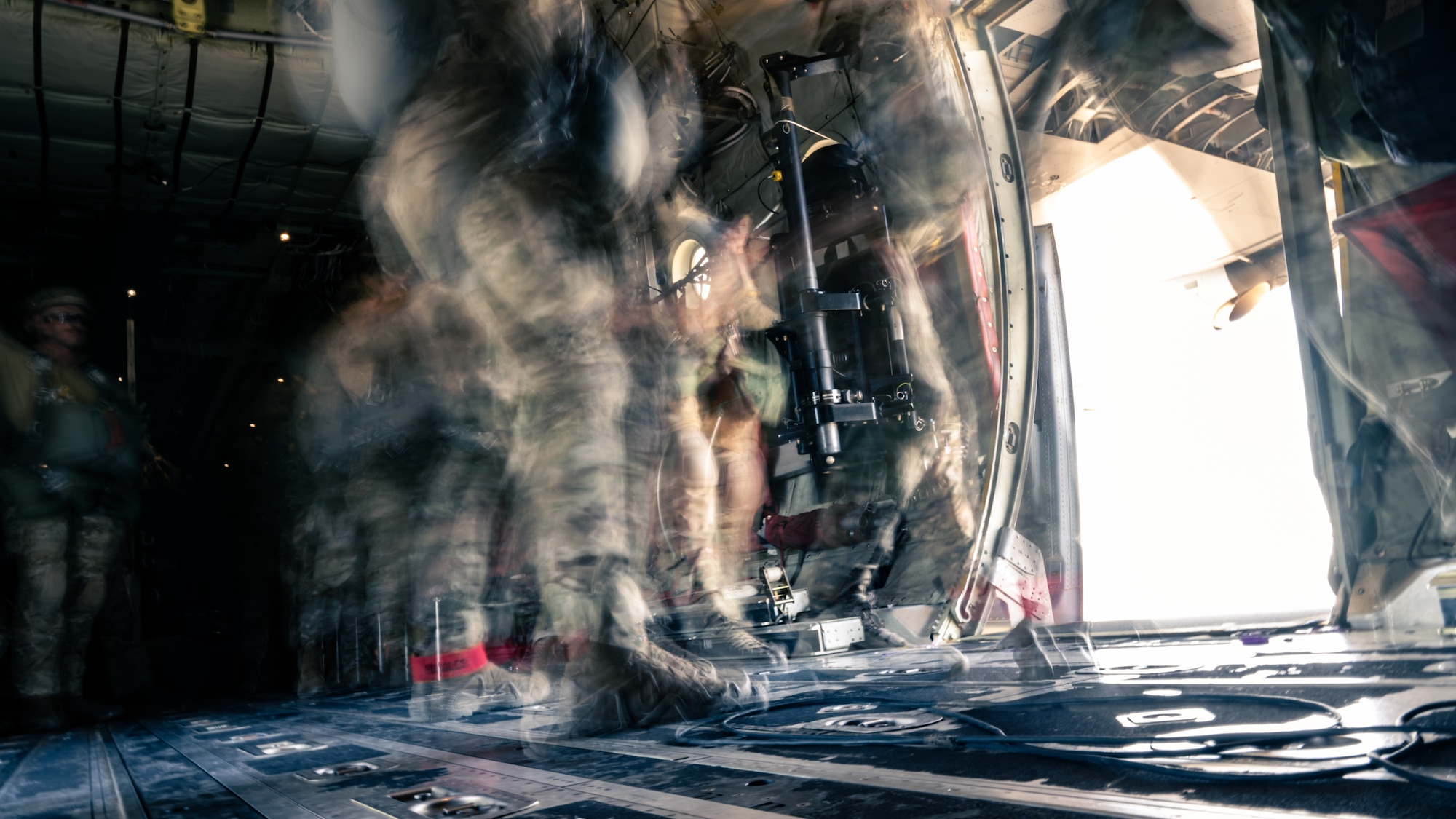 Texas Army National Guard Soldiers assigned to the 1st Battalion, 143rd Infantry Airborne Regiment jump from a C-130J Super Hercules from the 386th Air Expeditionary Wing during an airborne operation over Egypt in support of exercise Bright Star 23, Sept. 7, 2023. Bright Star 23 is a multilateral U.S. Central Command exercise held with the Arab Republic of Egypt across air, land, and sea domains that promotes and enhances regional security and cooperation, and improves interoperability in irregular warfare against hybrid threat scenarios. (U.S. Air Force photo by Staff Sgt. Kevin Long)