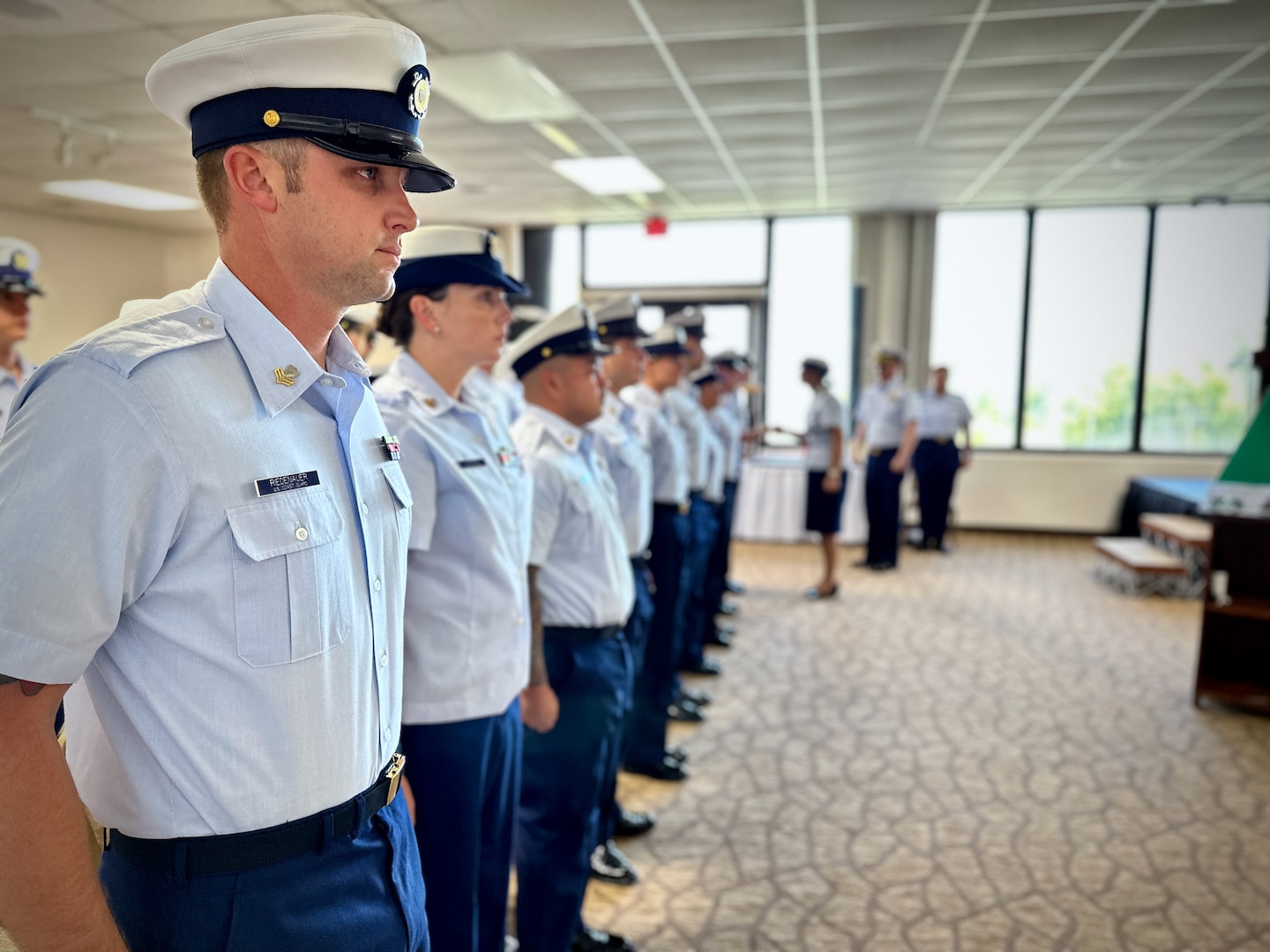 Cmdr. Linden Dahlkemper, the incumbent commanding officer, and Cmdr. Christopher Jasnoch, the prospective commanding officer, inspect the USCGC Hickory (WLB 212) crew at a change of command ceremony held at the Top o’the Mar in Guam on Wednesday, Sep. 13, 2023. The ceremony also signaled the official shift of the 225-foot seagoing buoy tender in Guam from USCGC Sequoia (WLB 215), currently at its major maintenance availability (MMA) at the U.S. Coast Guard Yard in Baltimore, to USCGC Hickory, which is just completing MMA and will now serve the Western Pacific. (U.S. Coast Guard photo by Chief Warrant Officer Sara Muir)