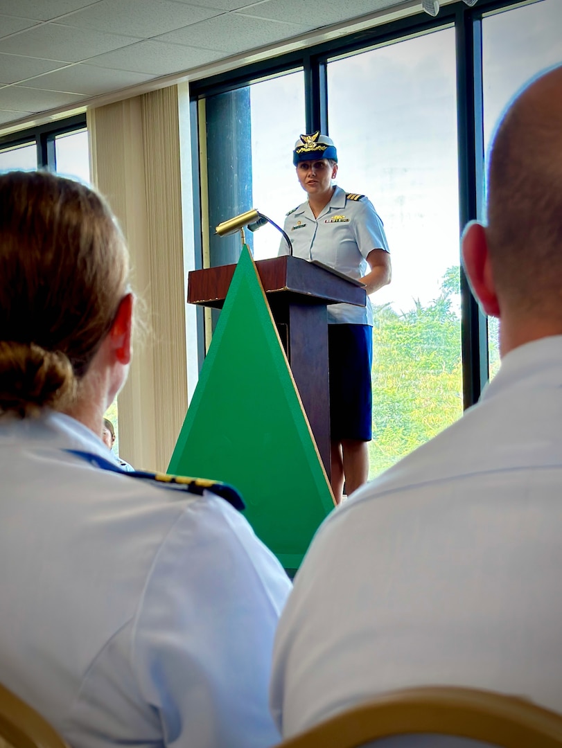 Cmdr. Linden Dahlkemper gives remarks and reads her orders to the Office of Cutter Forces in a change of command ceremony for the USCGC Sequoia (WLB 215) held at the Top o’the Mar in Guam on Wednesday, Sep. 13, 2023. The ceremony also signaled the official shift of the 225-foot seagoing buoy tender in Guam from USCGC Sequoia (WLB 215), currently at its major maintenance availability (MMA) at the U.S. Coast Guard Yard in Baltimore, to USCGC Hickory, which is just completing MMA and will now serve the Western Pacific. (U.S. Coast Guard photo by Chief Warrant Officer Sara Muir)
