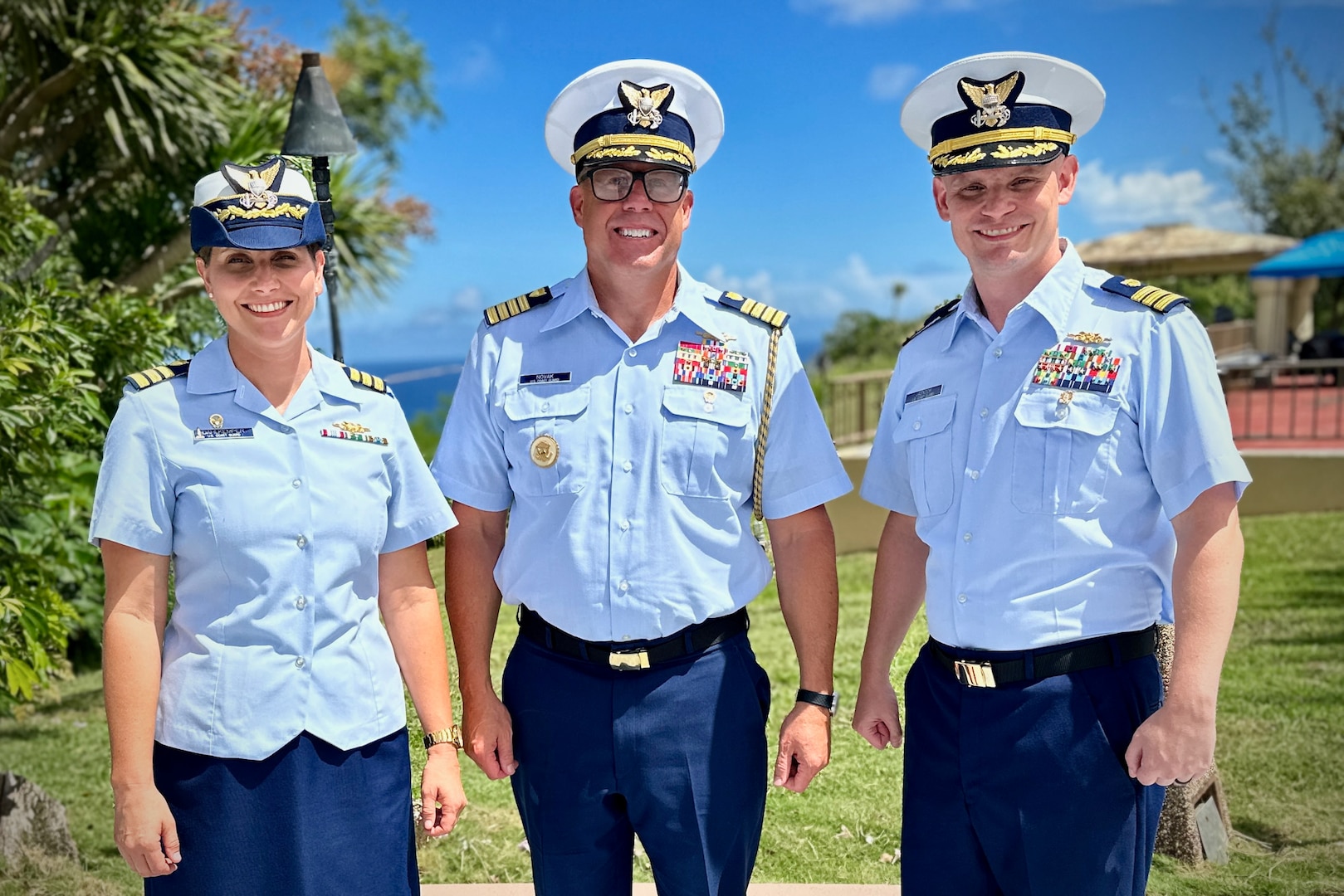 Cmdr. Christopher Jasnoch (left), the new commanding officer of USCGC Hickory (WLB 212), stands for a photo with Cmdr. Linden Dahlkemper (right), the former commanding officer, and Capt. Blake Novak (center), the U.S. Coast Guard 14th District chief of staff, following a change of command ceremony held at the Top o’the Mar in Guam on Wednesday, Sep. 13, 2023. The ceremony also signaled the official shift of the 225-foot seagoing buoy tender in Guam from USCGC Sequoia (WLB 215), currently at its major maintenance availability (MMA) at the U.S. Coast Guard Yard in Baltimore, to USCGC Hickory, which is just completing MMA and will now serve the Western Pacific. (U.S. Coast Guard photo by Chief Warrant Officer Sara Muir)