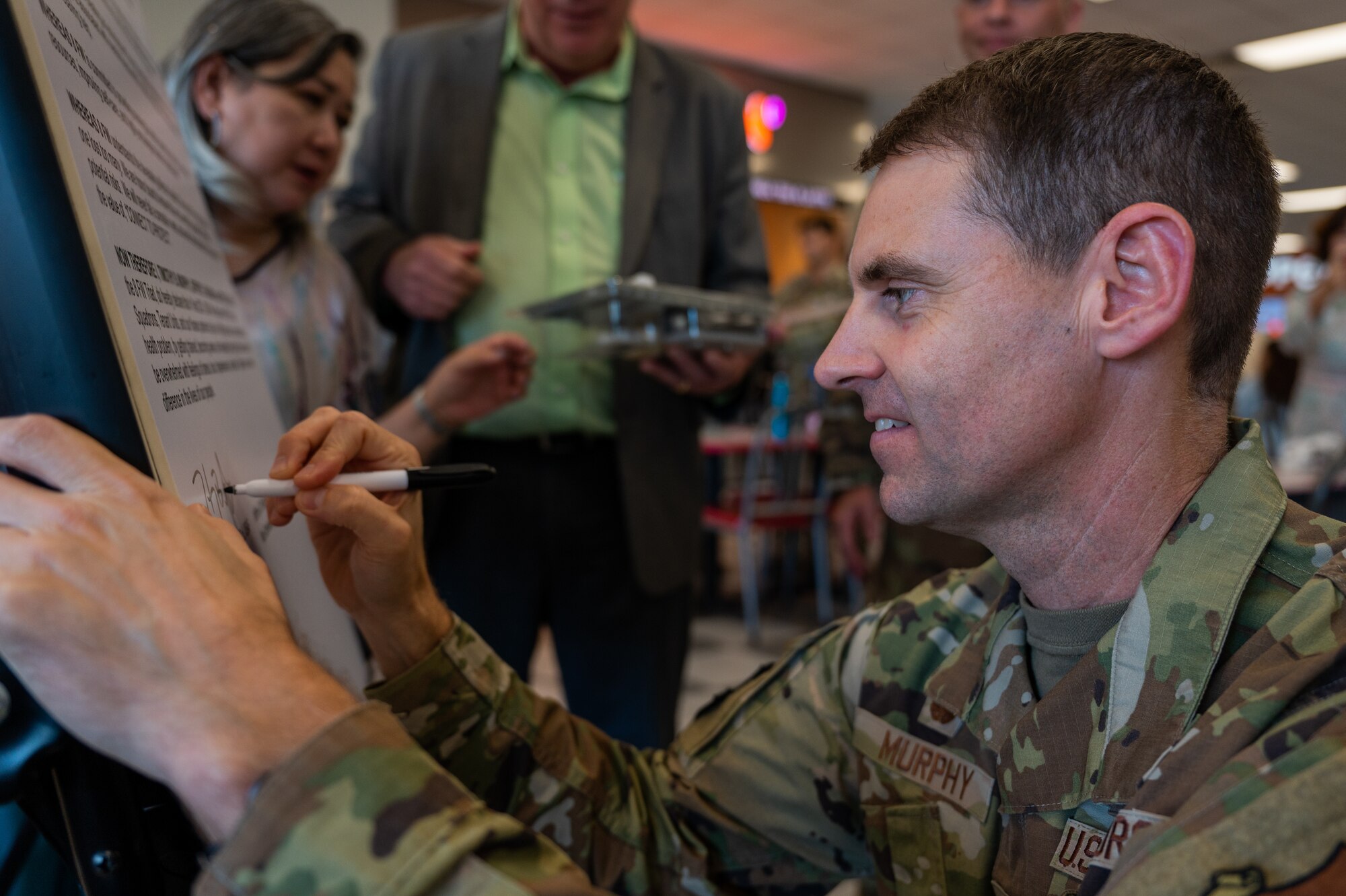 Col. Timothy B. Murphy signs the 2023 suicide prevention proclamation affirming support for Suicide Prevention and Awarenesss efforts.